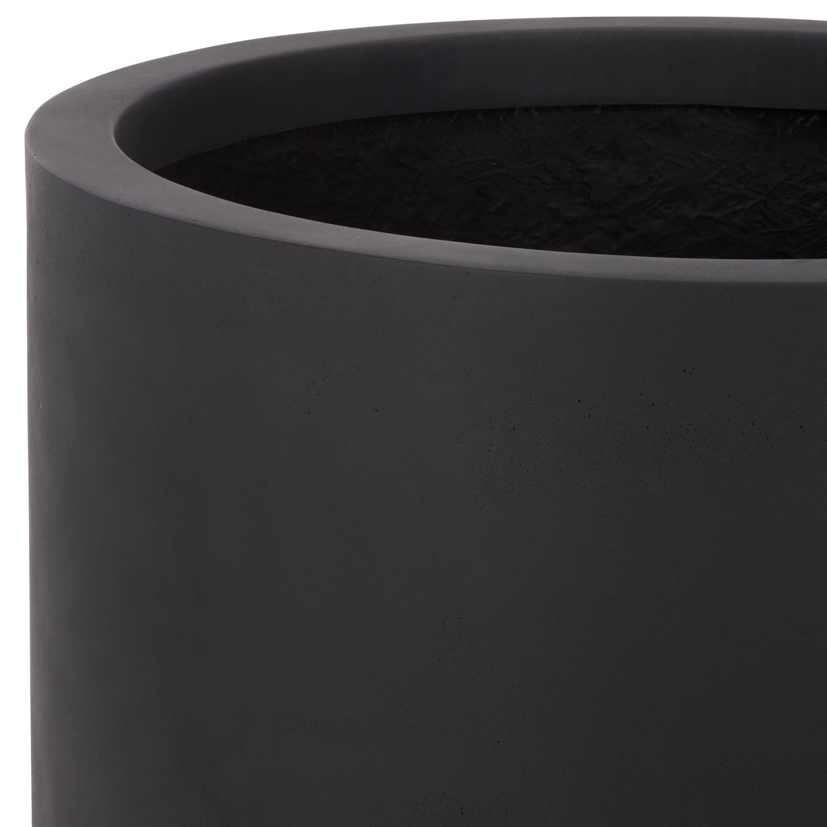 Smooth black planter rim surrounds a deep planting space and textured interior