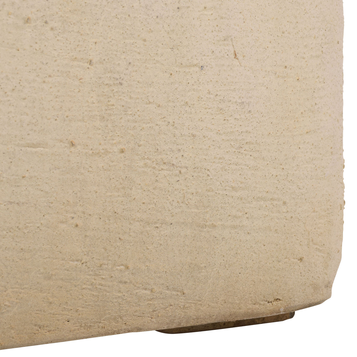 A small foot lifts the beige planter's gently rounded lower edge. || PAT1408B || leg_studio