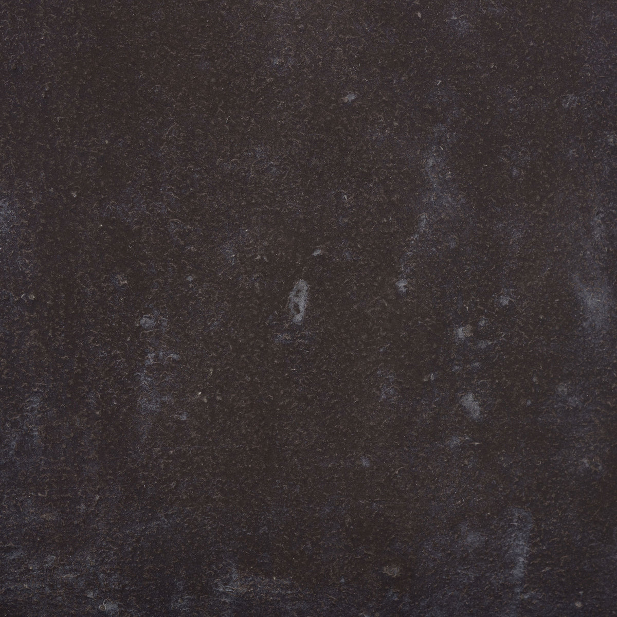 Earthy brown finish shows delicate marks and softly shifting dark tones. || PAT1409A || swatch_studio