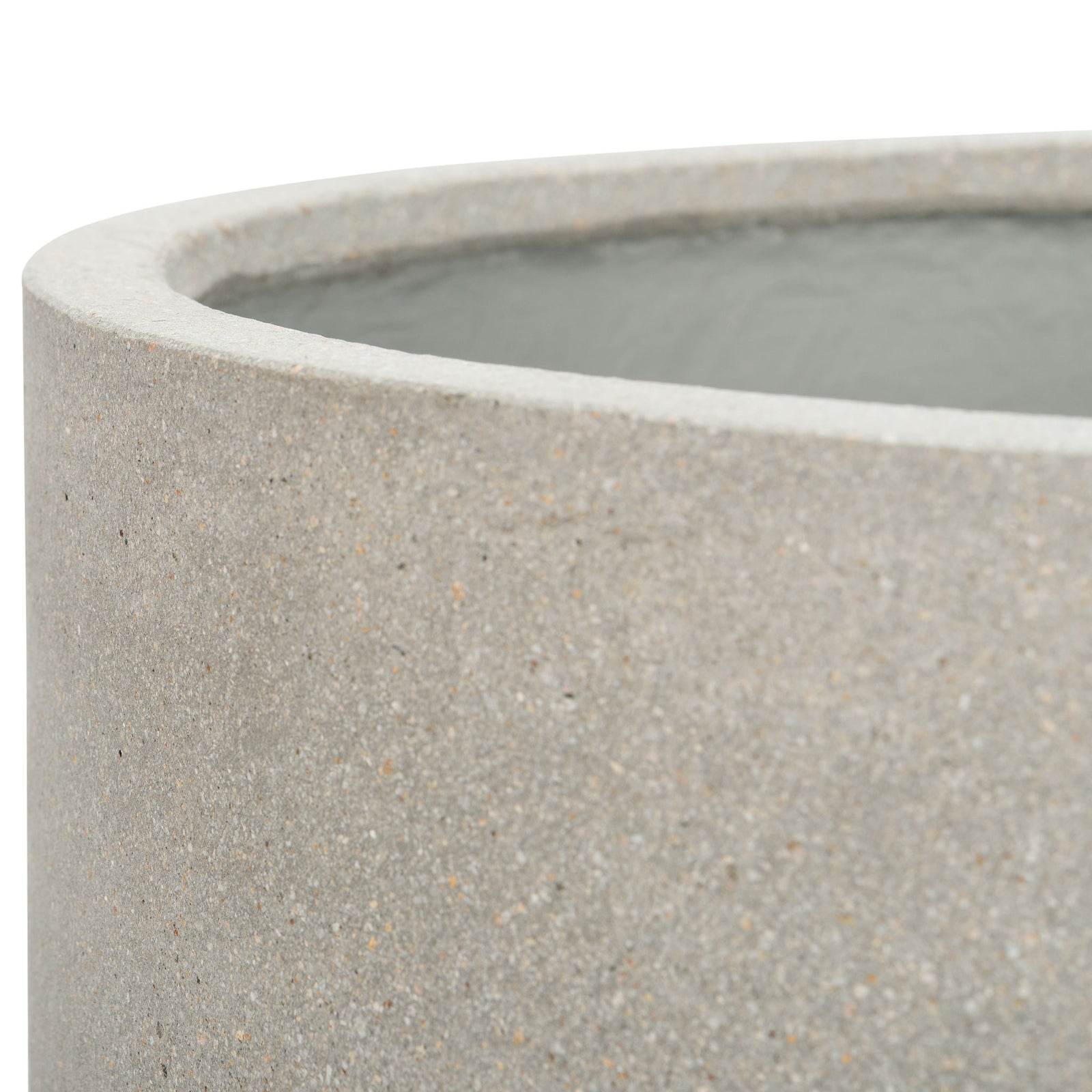 A softly rounded rim reveals the fine flecks and stone-like texture of the light gray pot. || PAT1514B || detail_studio