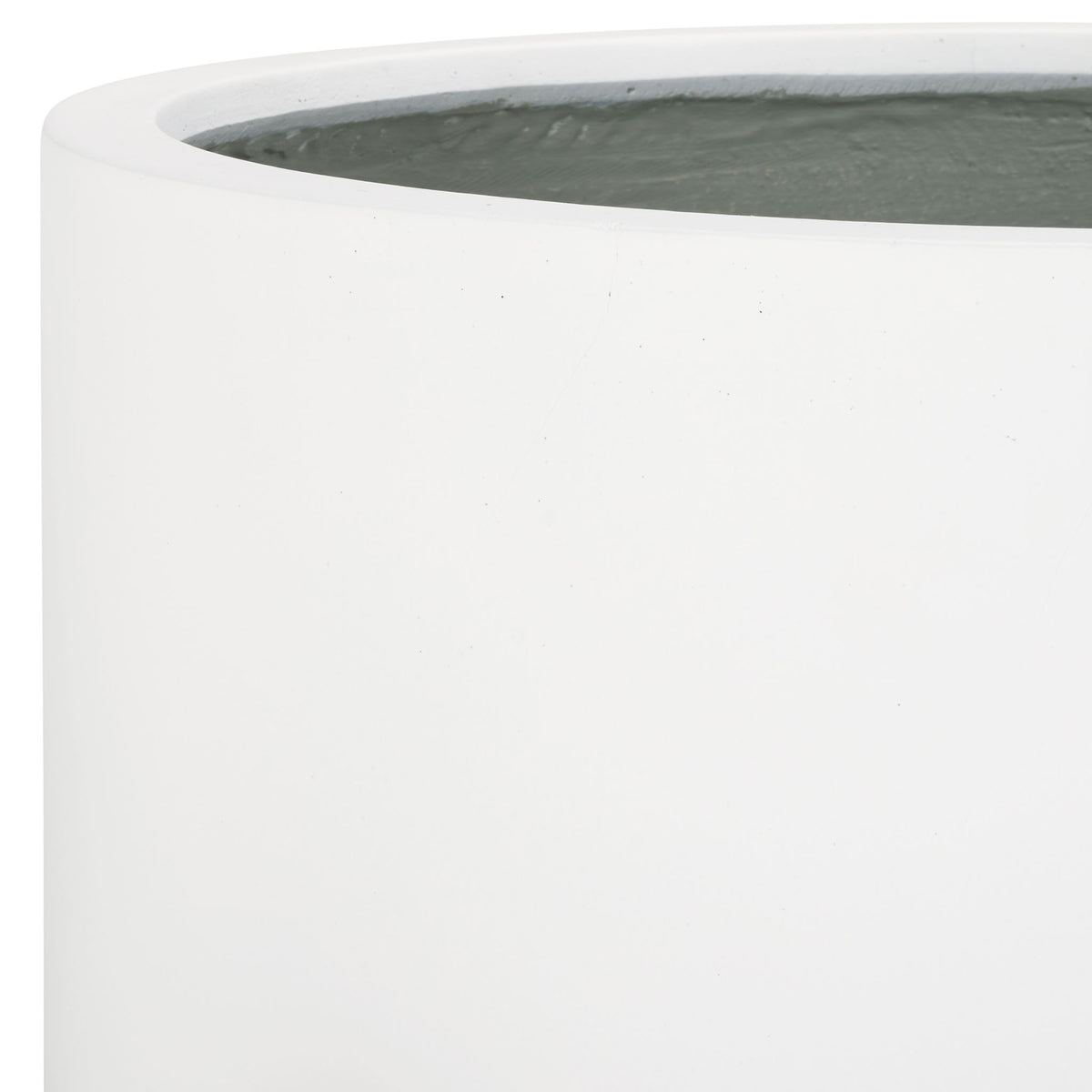 A thick white rim and smooth surface accent the generous planting basin.