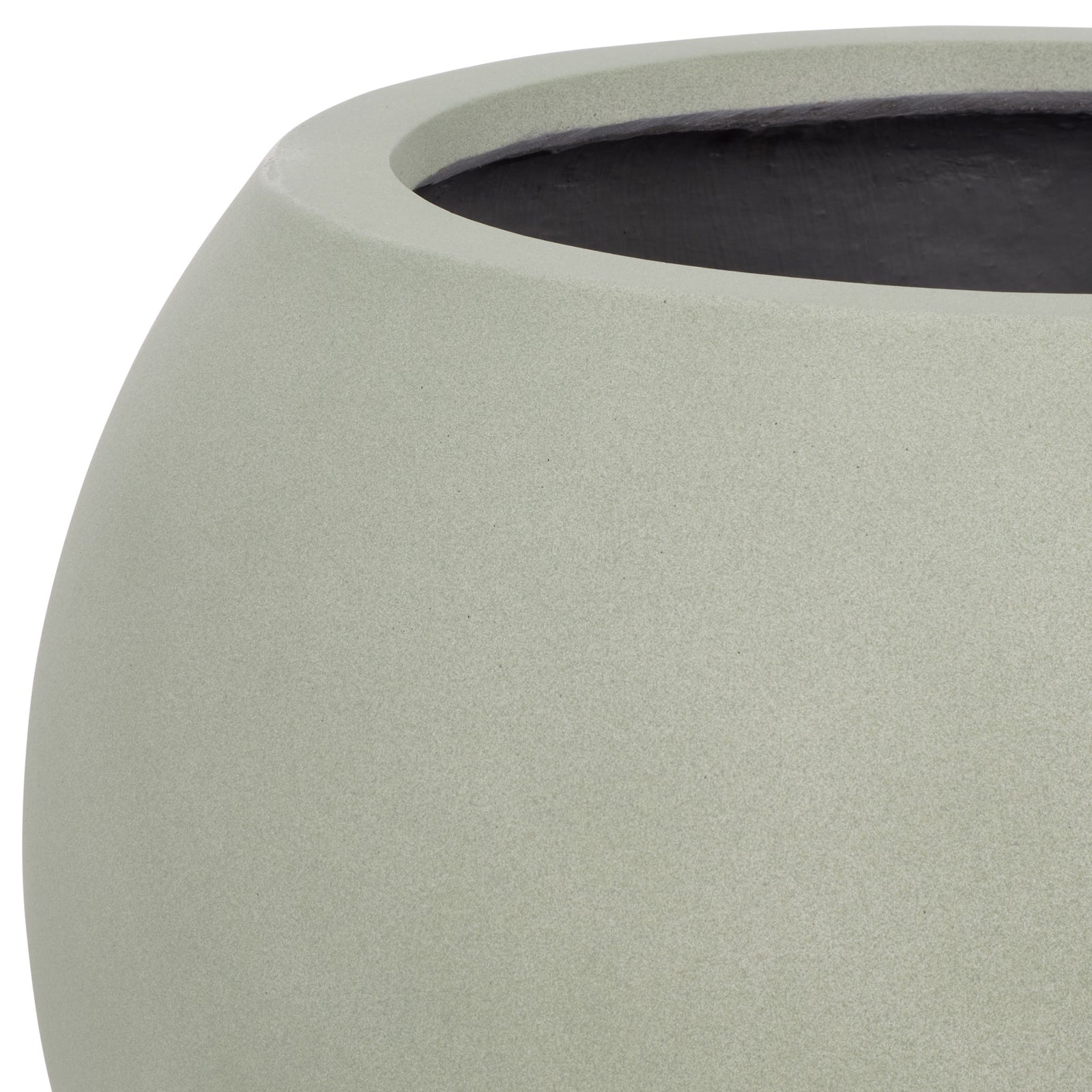 A thick sage-colored rim tops the large planter's quietly textured, rounded body. || PAT1519E || detail_studio