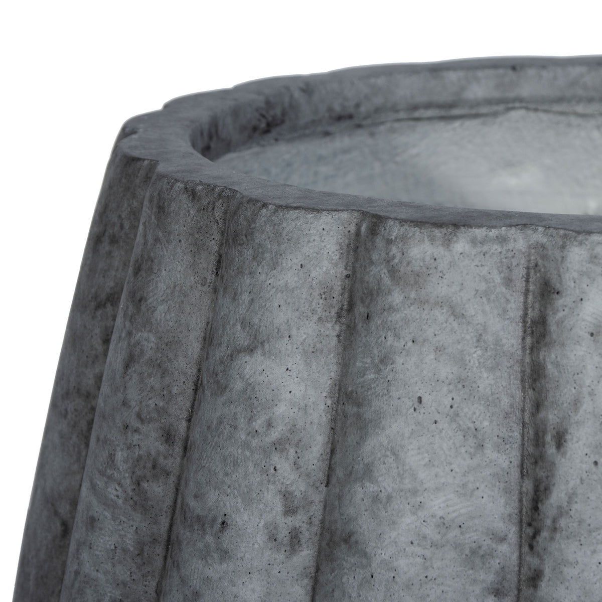 A thick rim crowns deeply fluted, mottled dark gray concrete || PAT1522A || detail_studio
