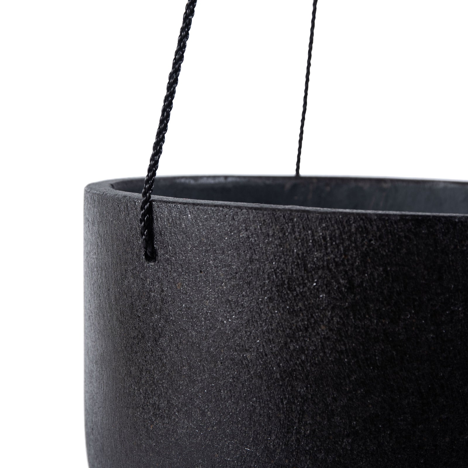 A textured black planter rim holds a dark braided hanging cord. || PAT1527A || detail_studio