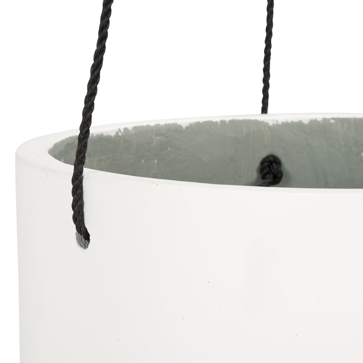 Dark hanging cords fasten through the smooth white rim above a gray interior. || PAT1527C || detail_studio