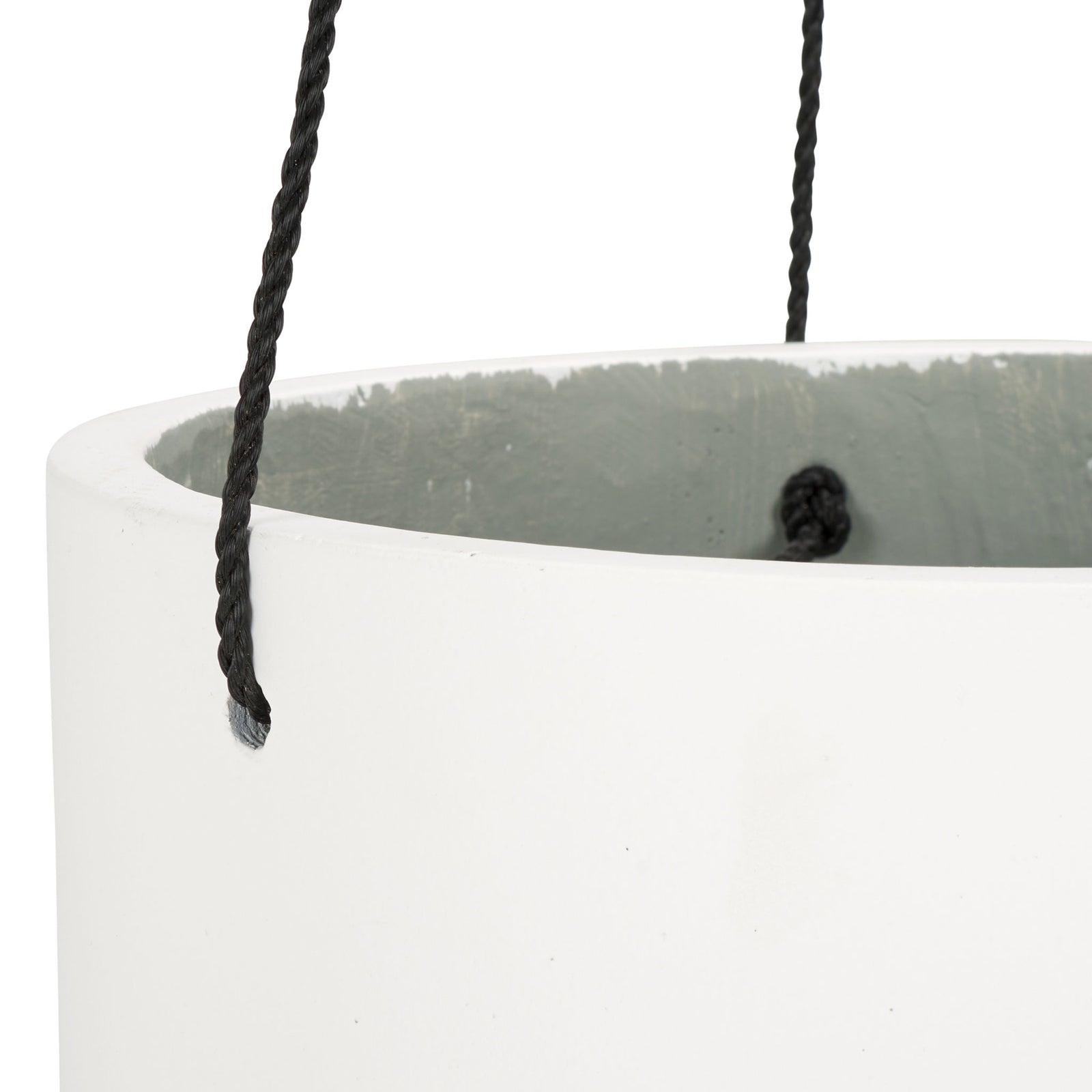 Dark hanging cords fasten through the smooth white rim above a gray interior. || PAT1527C || detail_studio