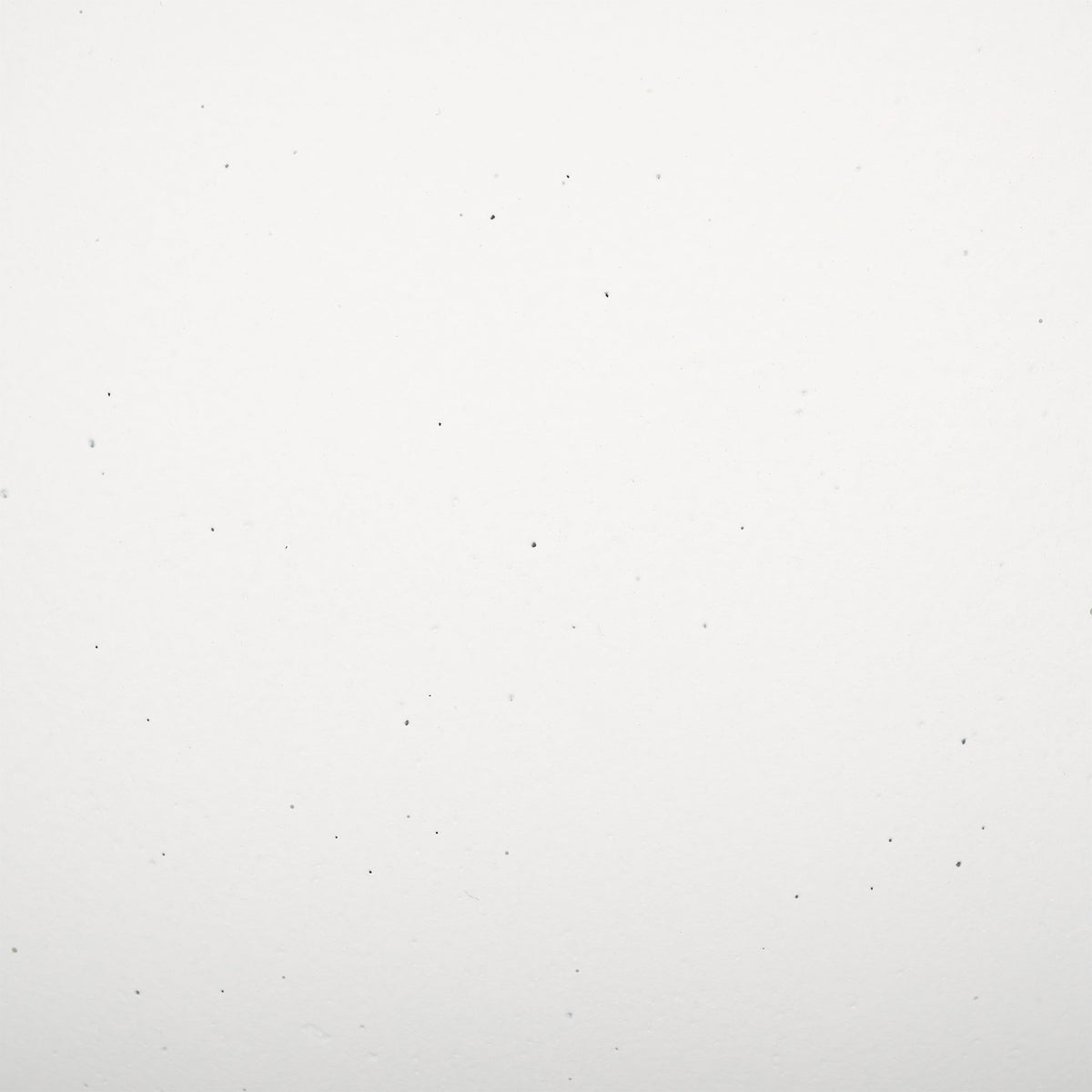 A soft white finish has faint speckling across its smooth surface. || PAT1527C || swatch_studio