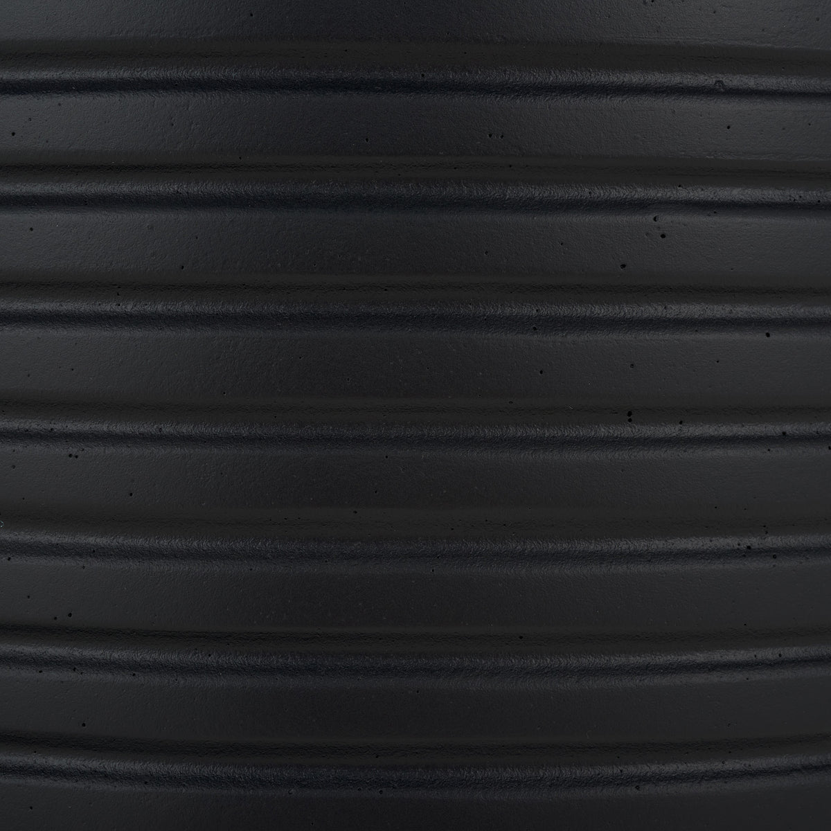 A rich black finish highlights the planter's raised horizontal bands and subtle texture || PAT1530A-SET2 || swatch_studio