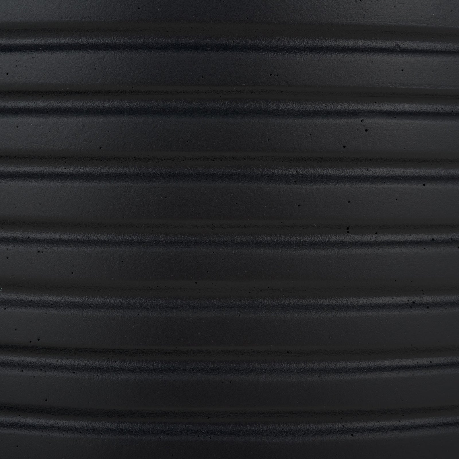 A rich black finish highlights the planter's raised horizontal bands and subtle texture || PAT1530A-SET2 || swatch_studio