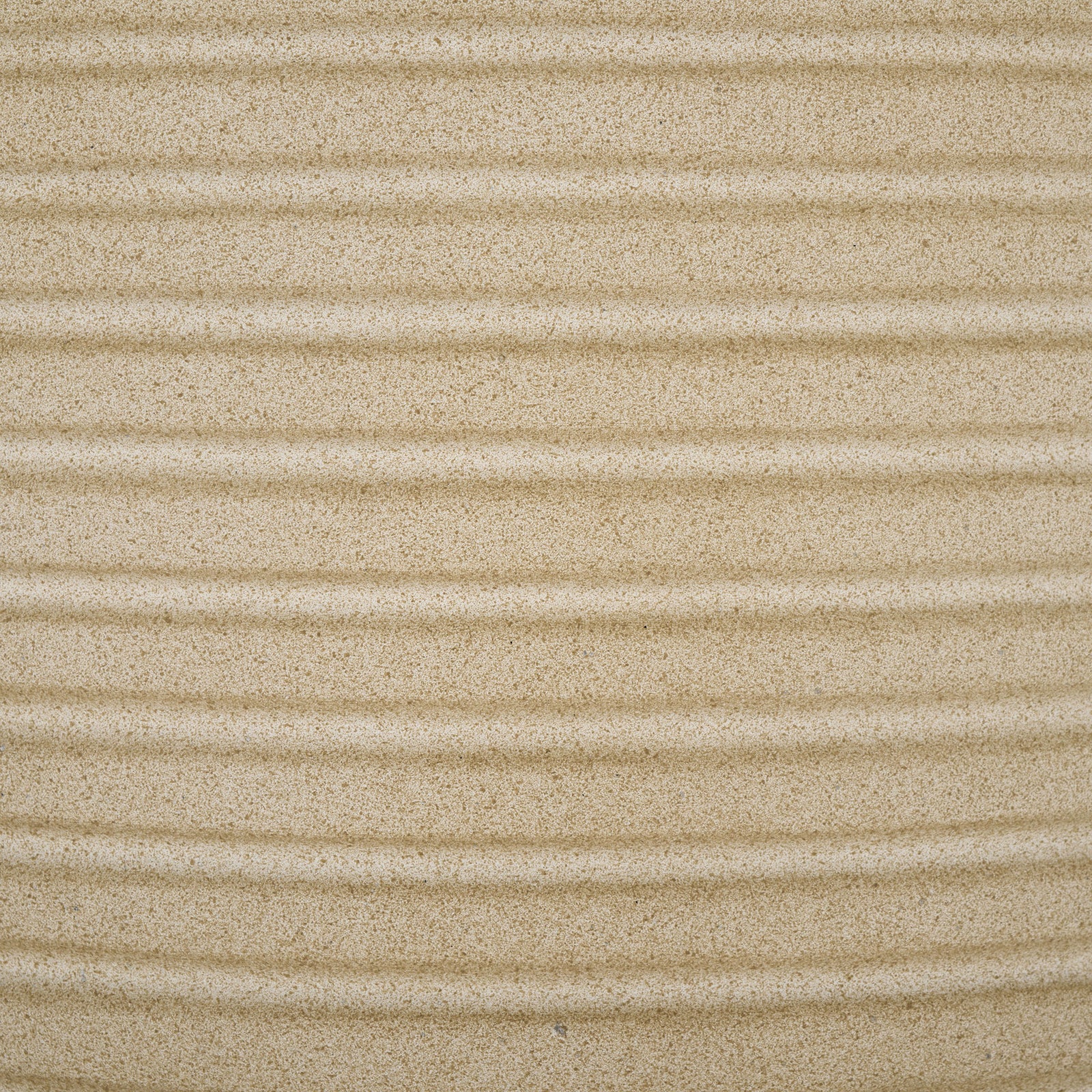 A warm beige, sandlike texture accentuates the planter's evenly spaced raised ribs || PAT1530B-SET2 || swatch_studio