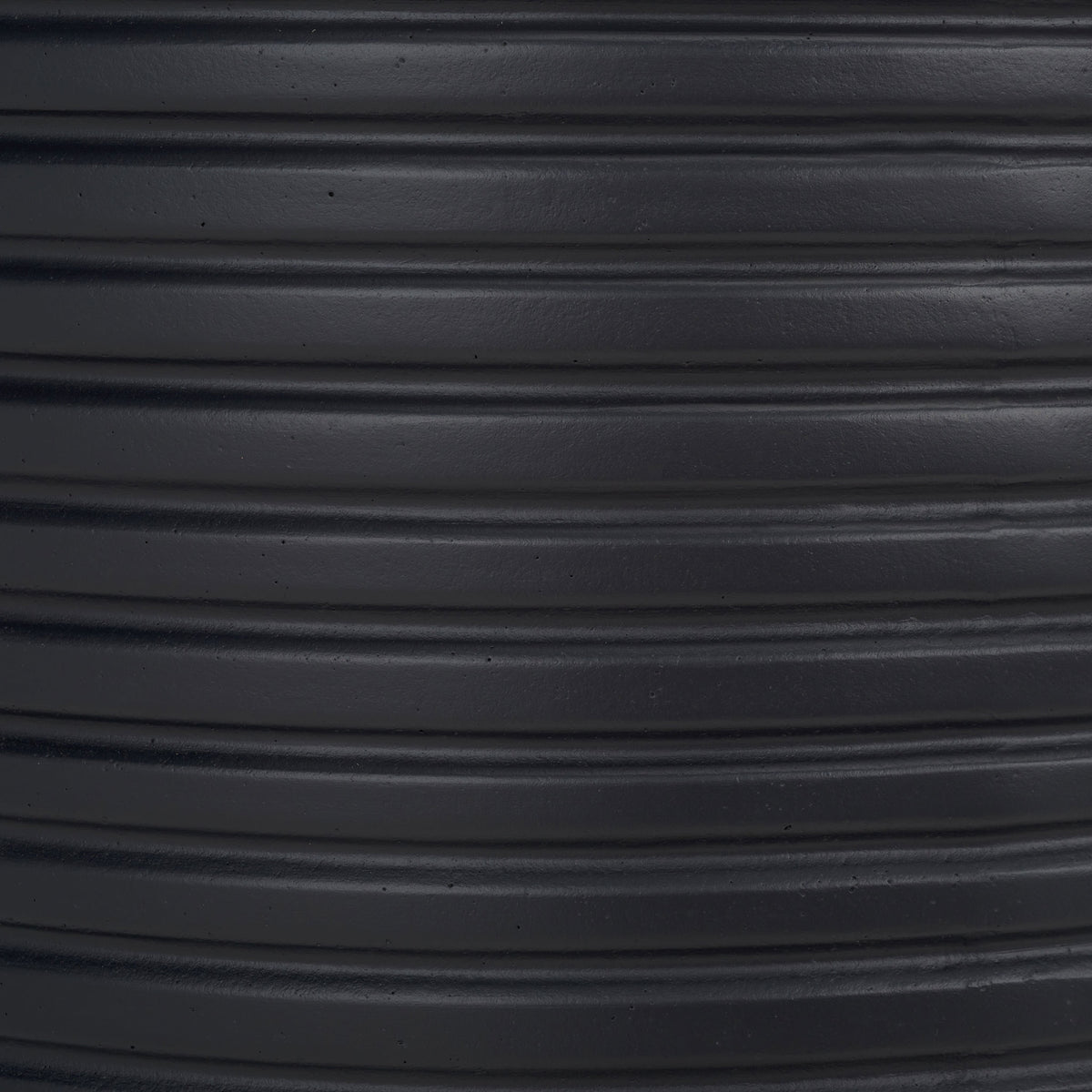 A deep black finish emphasizes crisp raised ribs and a faintly textured surface || PAT1531A || swatch_studio