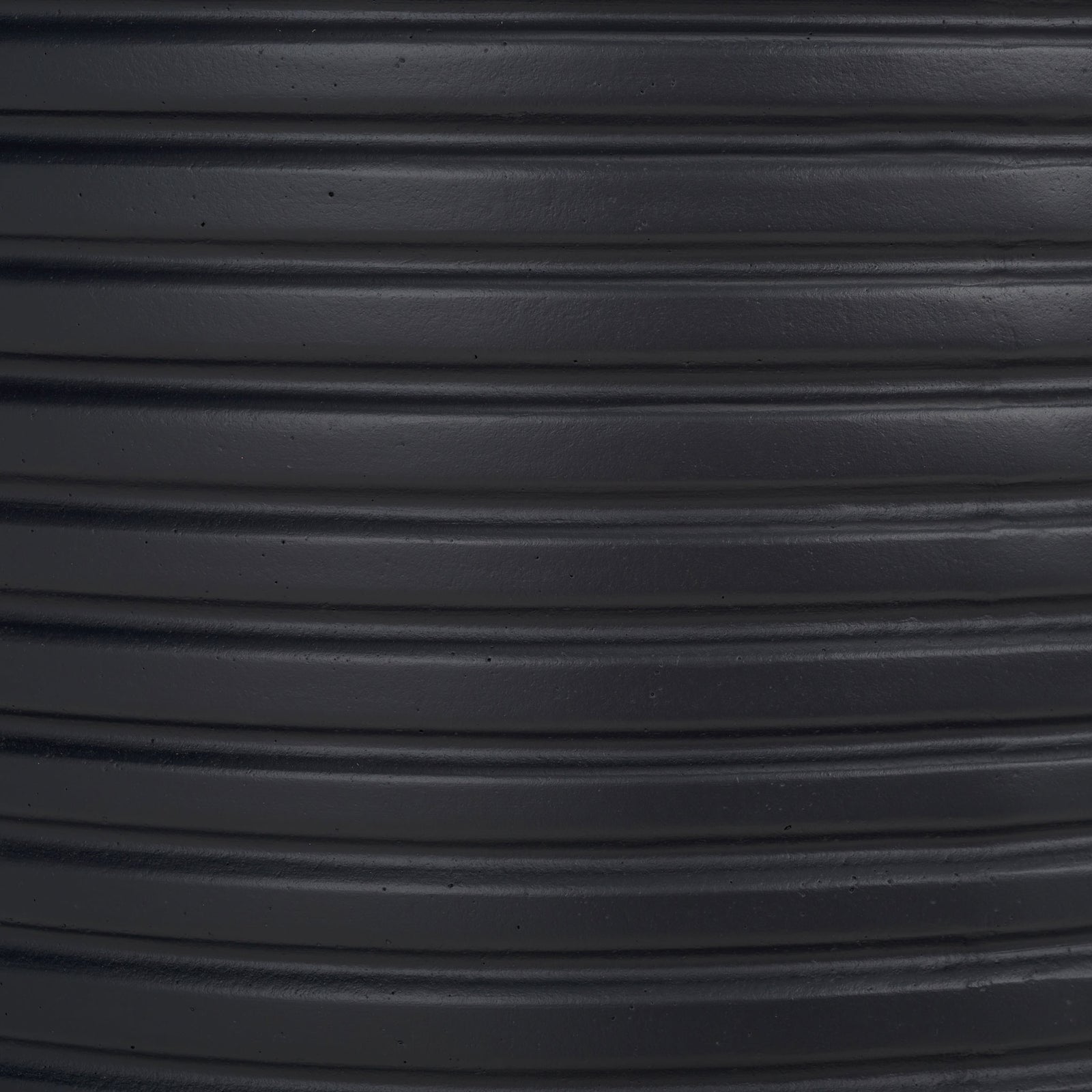 A deep black finish emphasizes crisp raised ribs and a faintly textured surface || PAT1531A || swatch_studio