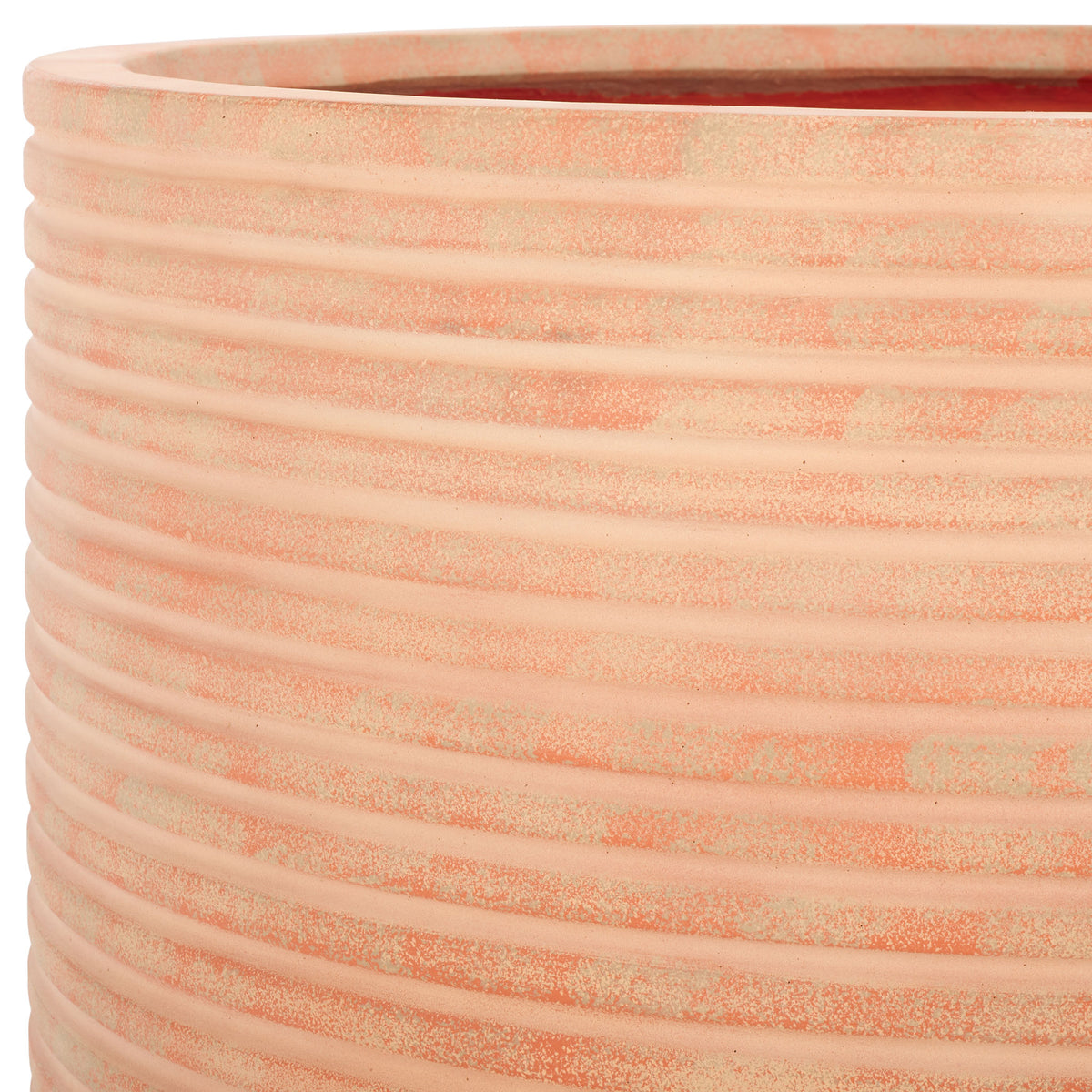 Warm terracotta coloring brings a rustic touch to the planter's thick rim and fine horizontal ribs || PAT1531D || detail_studio
