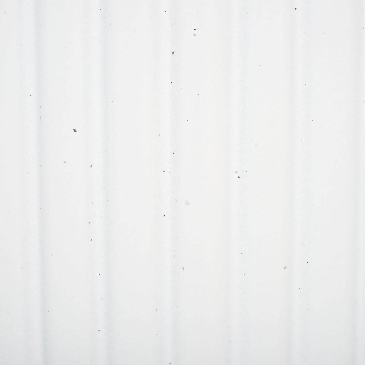 Tiny dark flecks punctuate a white finish shaped by delicate vertical flutes. || PAT1532C-SET2 || swatch_studio
