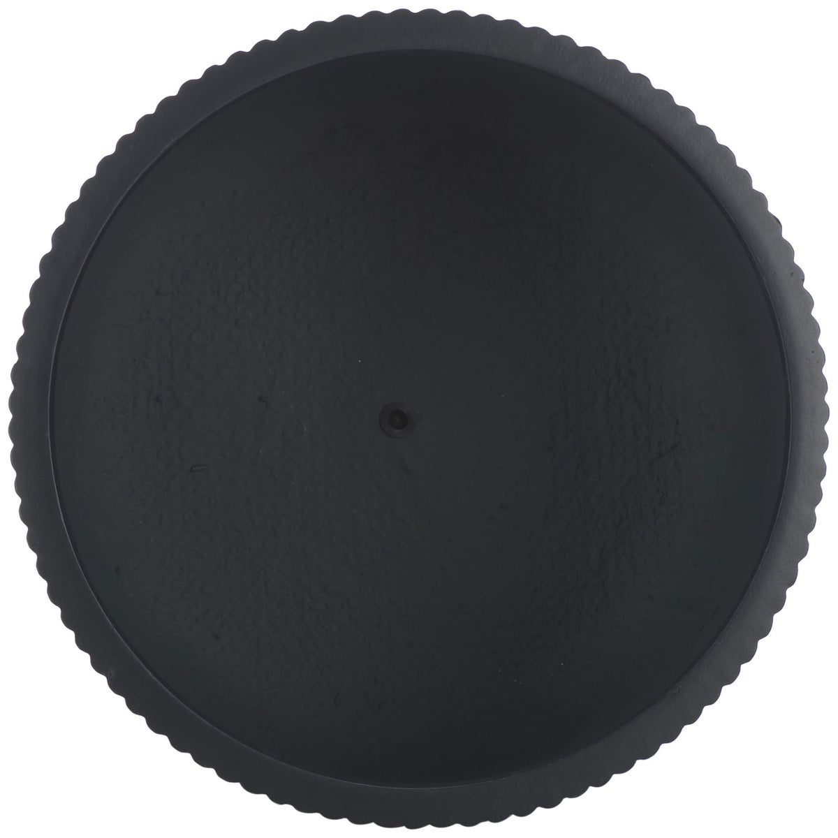 A gently scalloped black rim frames a broad, dark interior with a small central drain. || PAT1533A || top_studio
