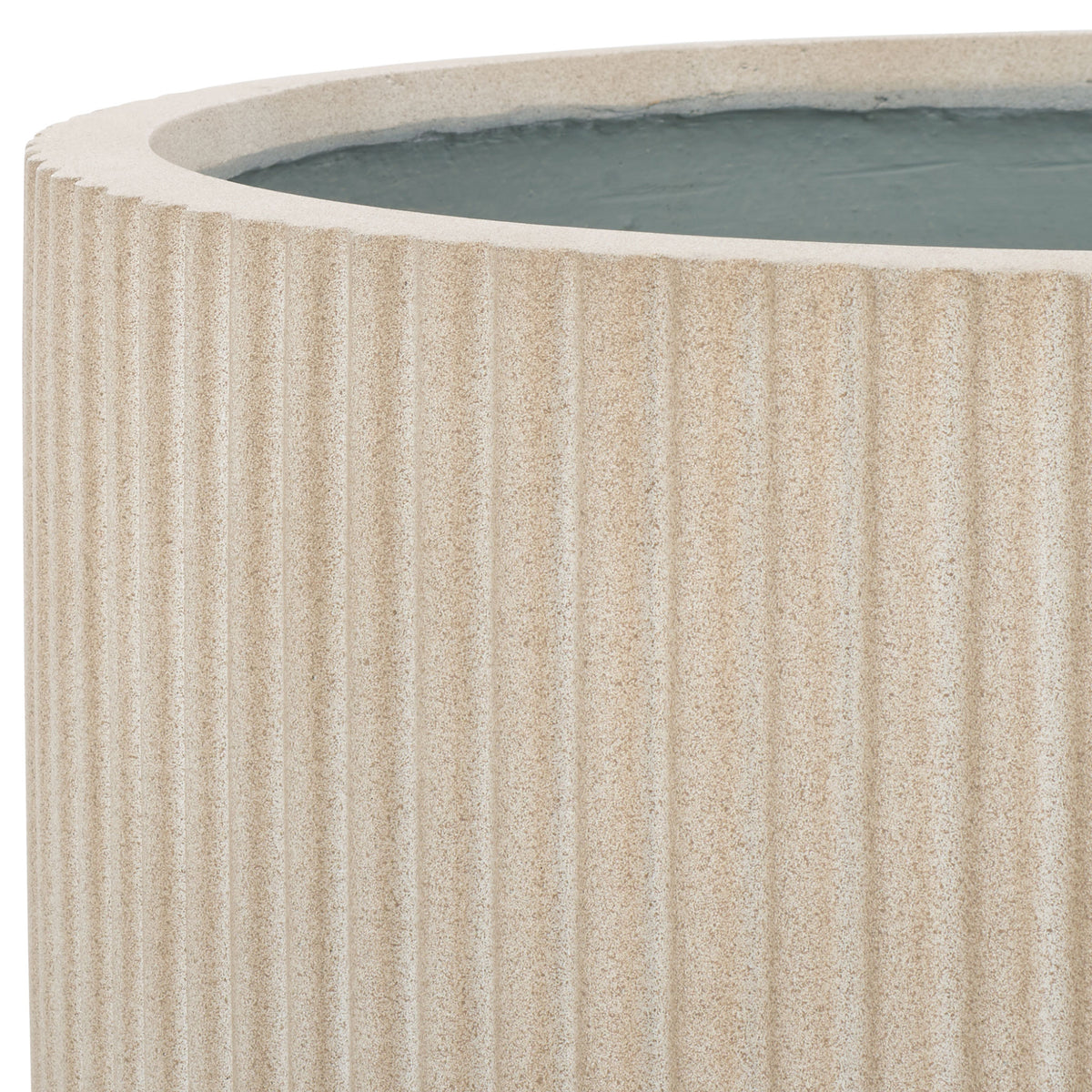 A broad beige rim and closely set flutes give the spacious planter a softly textured profile.
