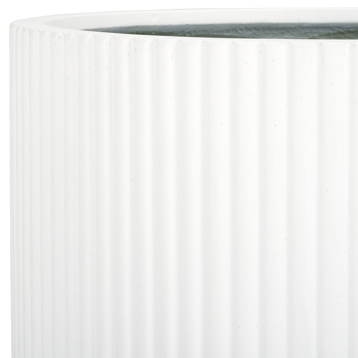 A clean white rim meets slim fluted sides and a contrasting charcoal-gray interior. || PAT1533C || detail_studio