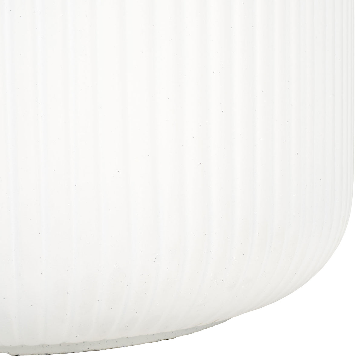Fine white fluting follows the planter's softly curved lower edge. || PAT1533C || leg_studio