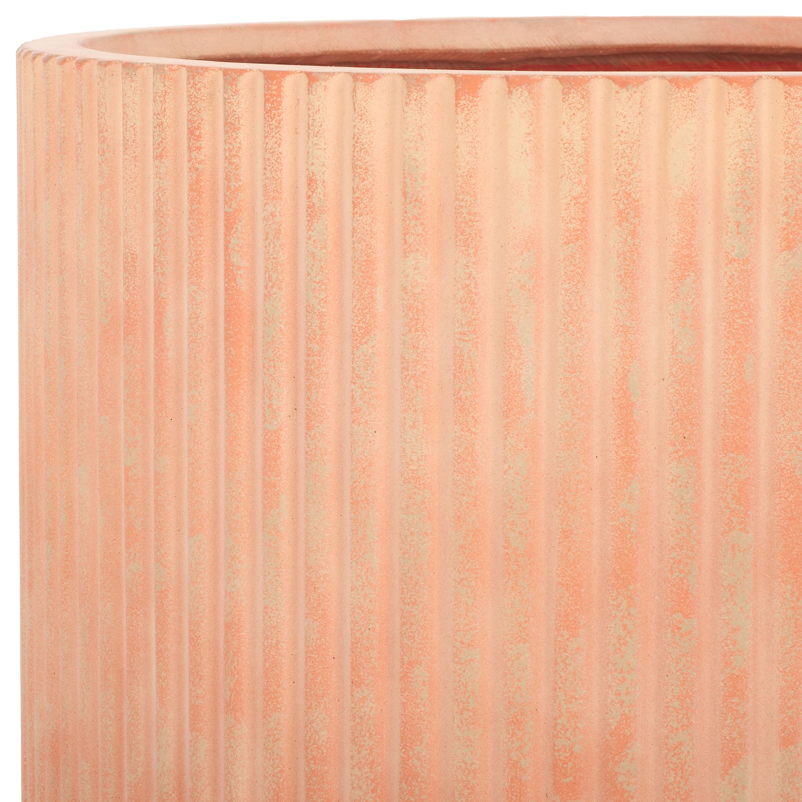 Warm terracotta coloring accents the thick lip and narrow vertical ribs of the roomy planter. || PAT1533D || detail_studio