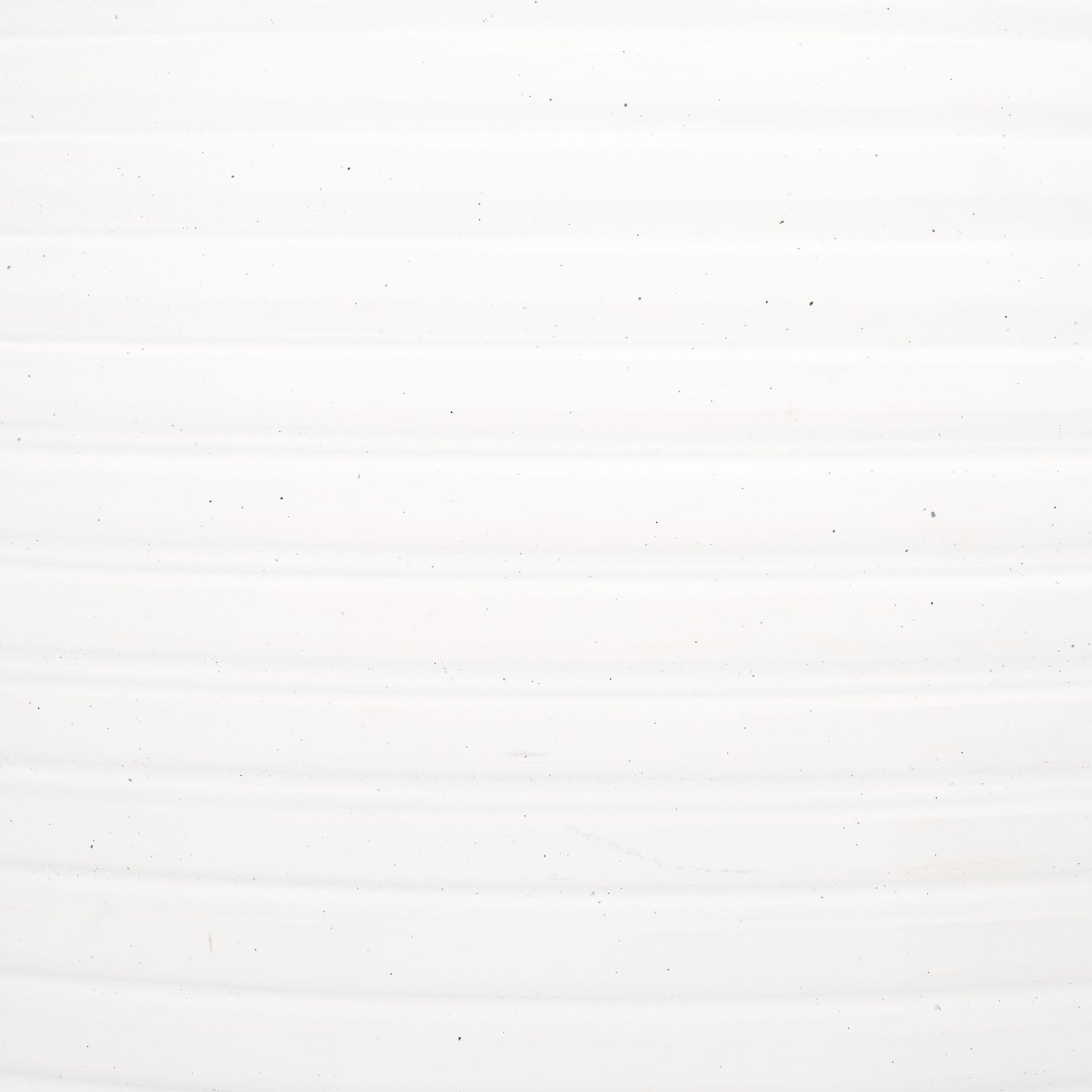 Bright white surface has gently raised bands and subtle speckled texture. || PAT1534C || swatch_studio