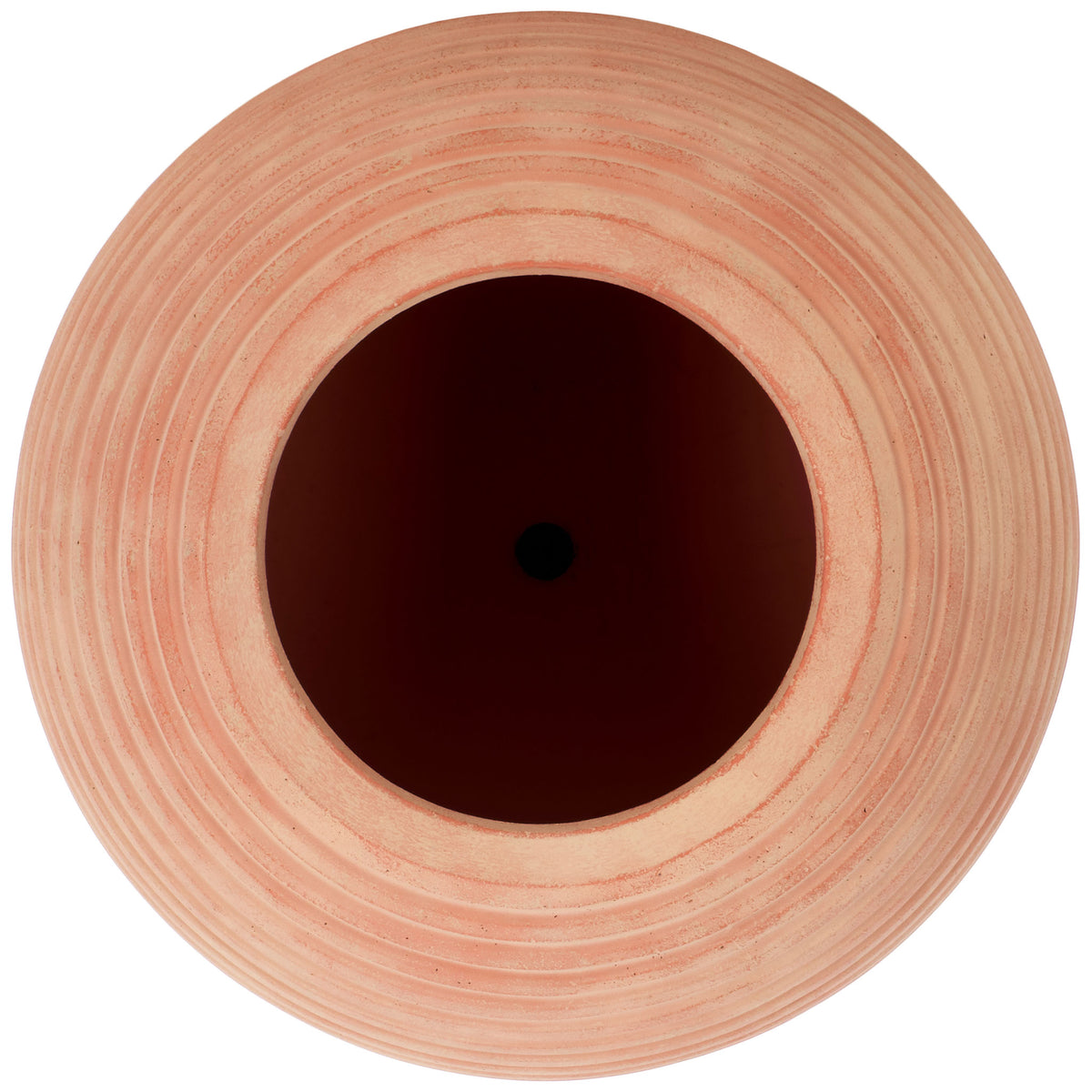 Concentric terracotta bands surround a deep planting cavity with a visible drainage hole. || PAT1534D || top_studio