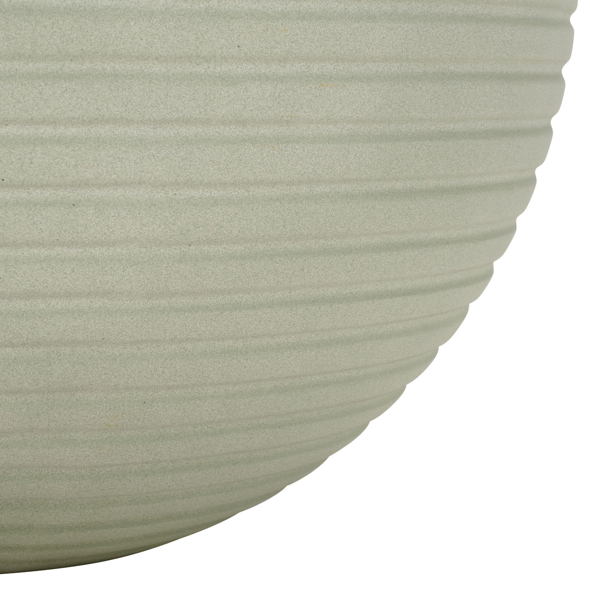 Sage planter's lower curve narrows into a rounded base beneath its fine ribbing. || PAT1534E || leg_studio