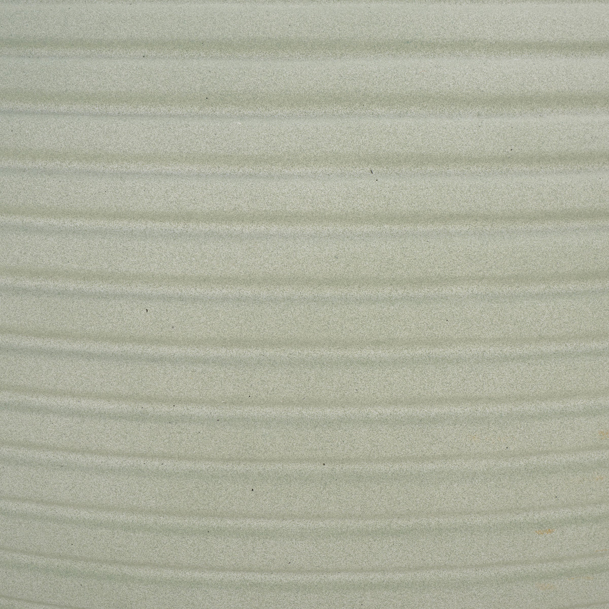 Muted sage surface blends fine grain with understated horizontal grooves. || PAT1534E || swatch_studio