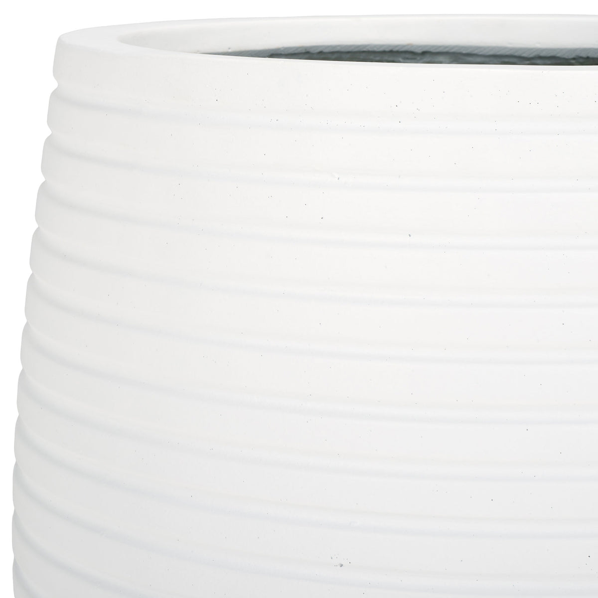 A clean white finish brings out the planter's rounded rim and soft horizontal ridges