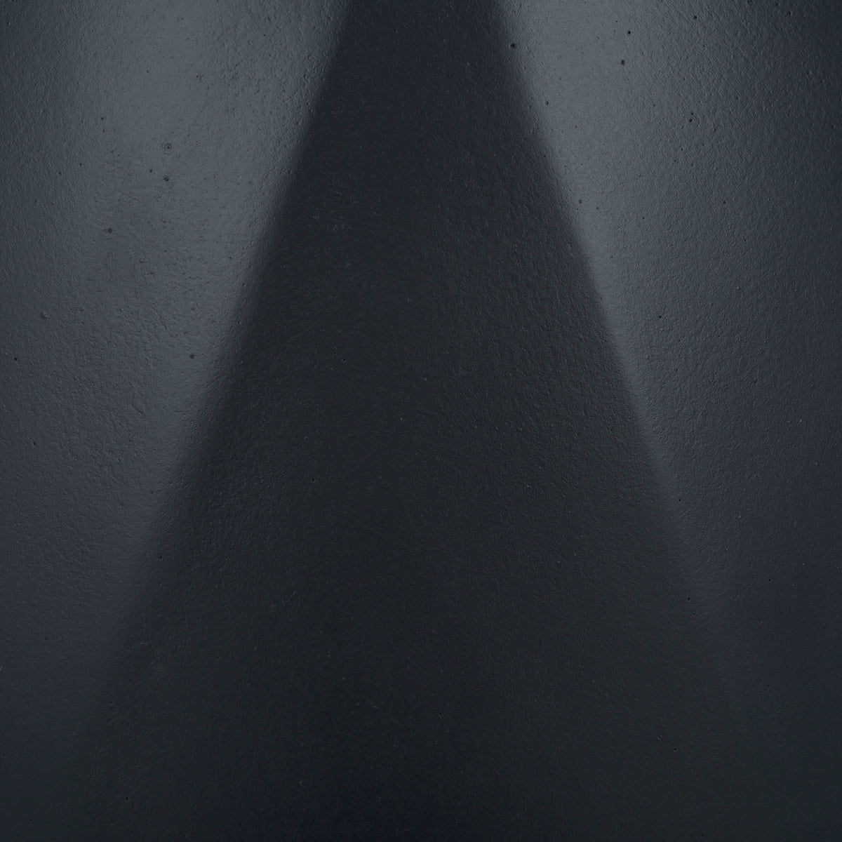 A deep black finish brings out the planter's subtly textured geometric facets. || PAT1536A-SET2 || swatch_studio