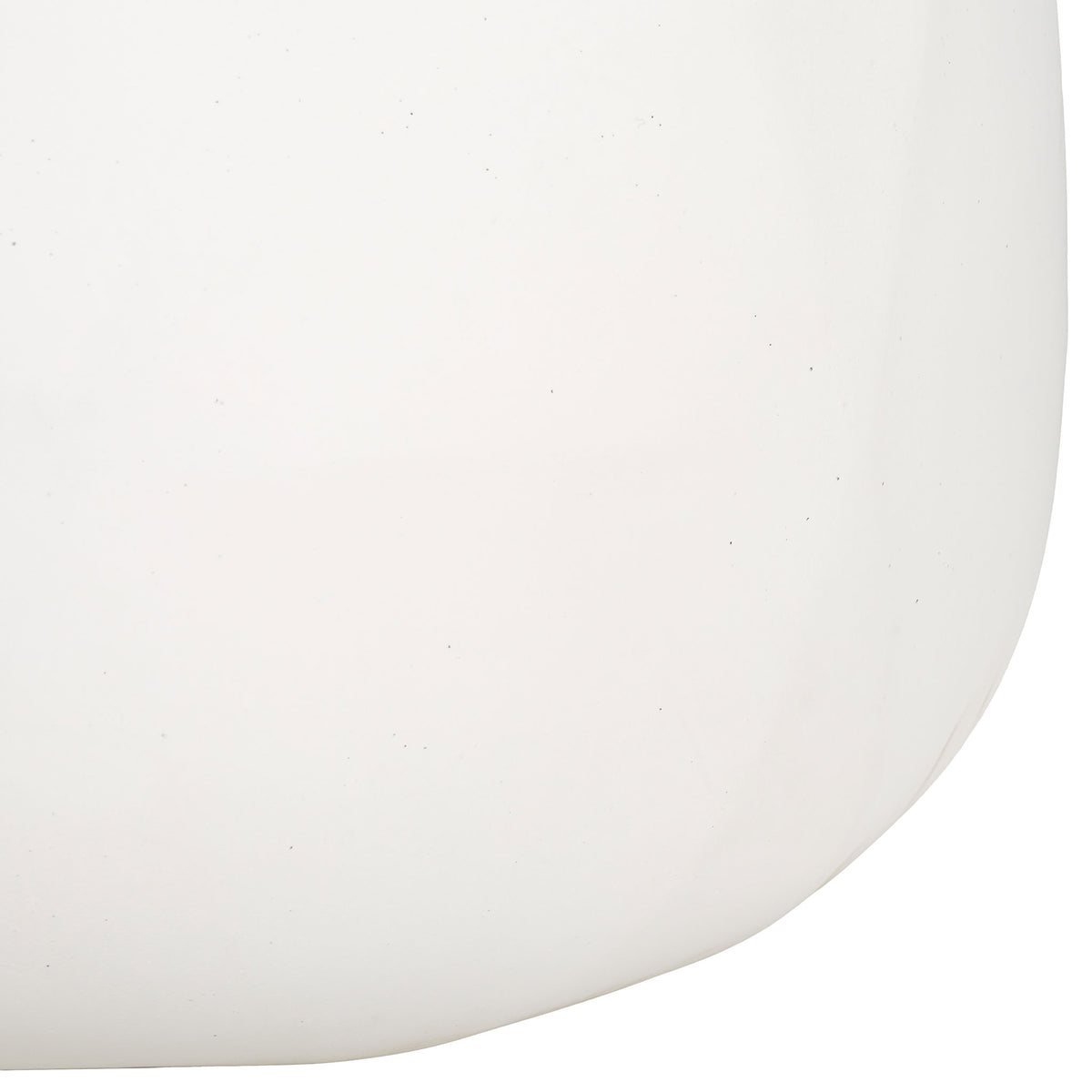 A softly curved base gives the white planter its clean, sculptural profile.