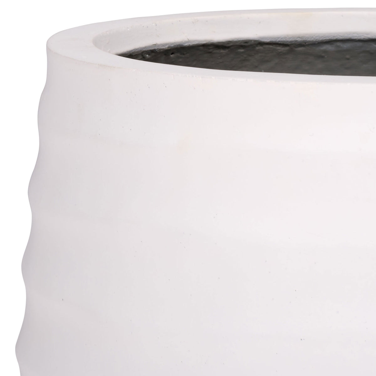 A clean white rim sits above the planter's subtly rippled sides. || PAT1542C || detail_studio