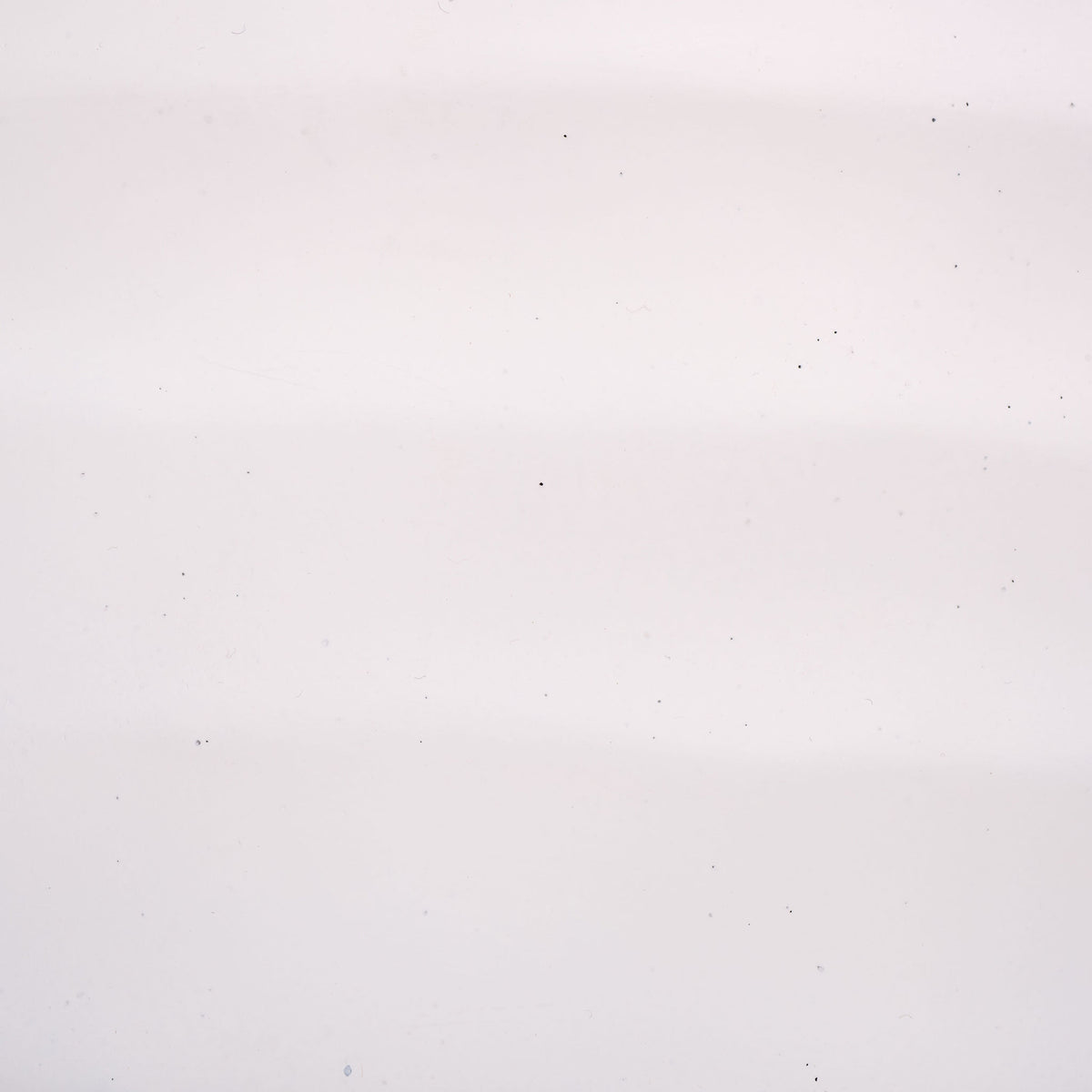 A smooth white finish highlights delicate tonal variation across the planter's surface. || PAT1542C || swatch_studio