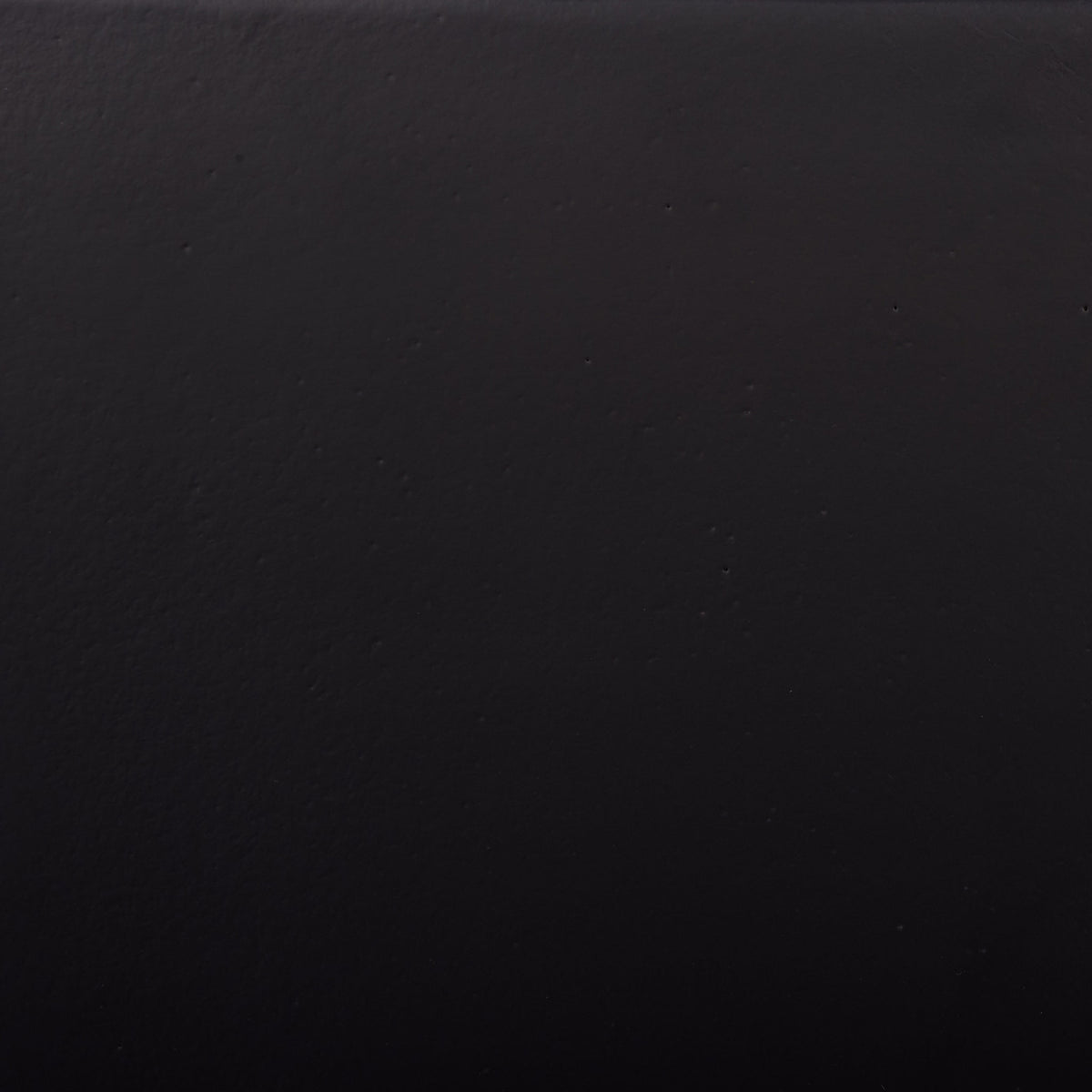 A deep black finish shows subtle texture for a quietly refined look. || PAT1543A || swatch_studio