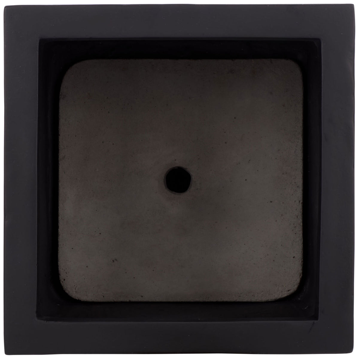 A recessed square planting well includes a drainage hole beneath its black rim. || PAT1543A || top_studio