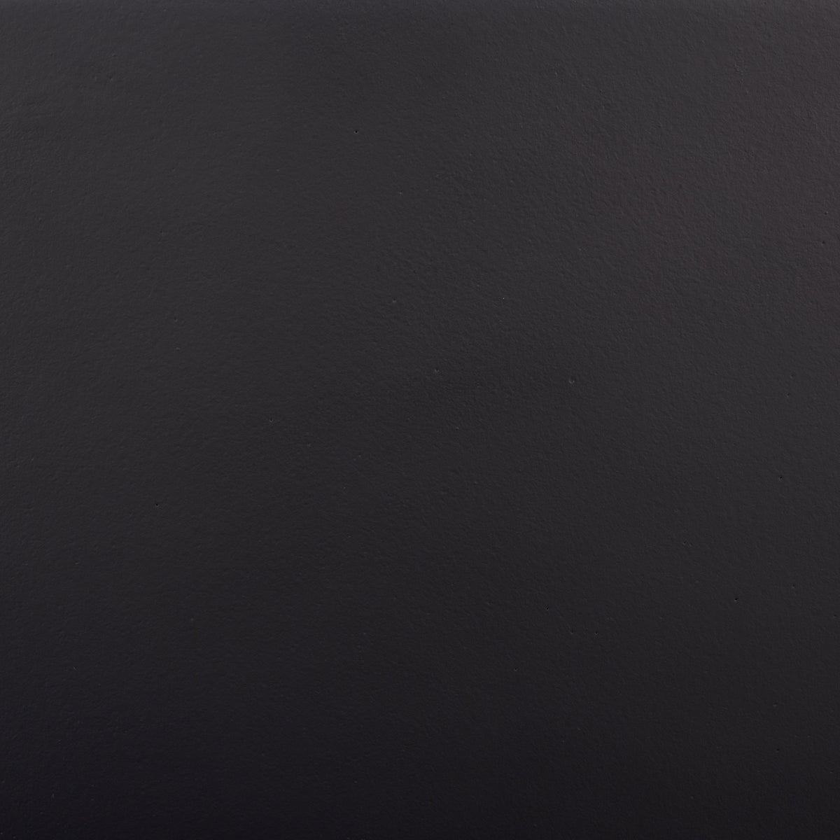Rich black color and a lightly textured surface lend the planter understated polish. || PAT1544A || swatch_studio