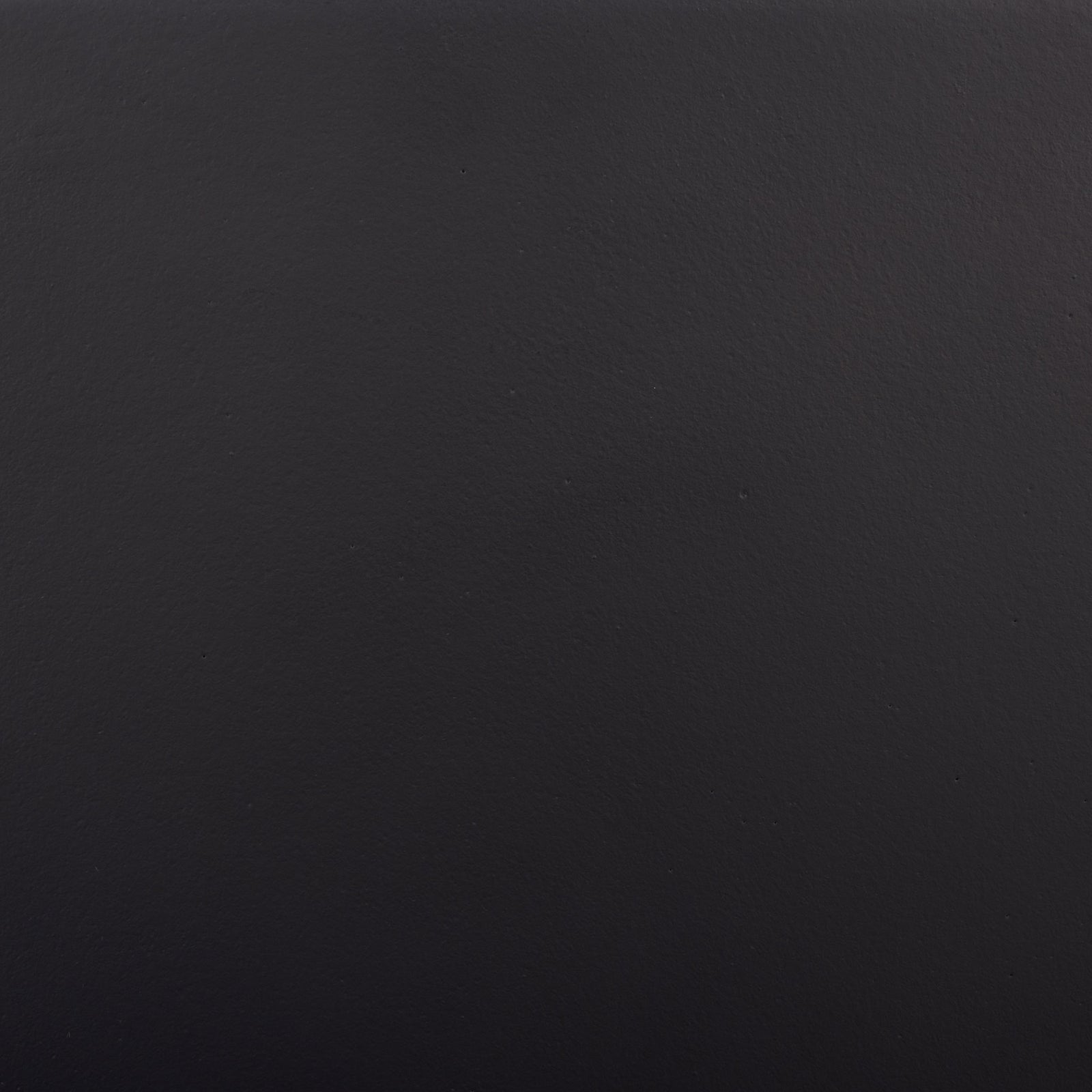 Rich black color and a lightly textured surface lend the planter understated polish. || PAT1544A || swatch_studio