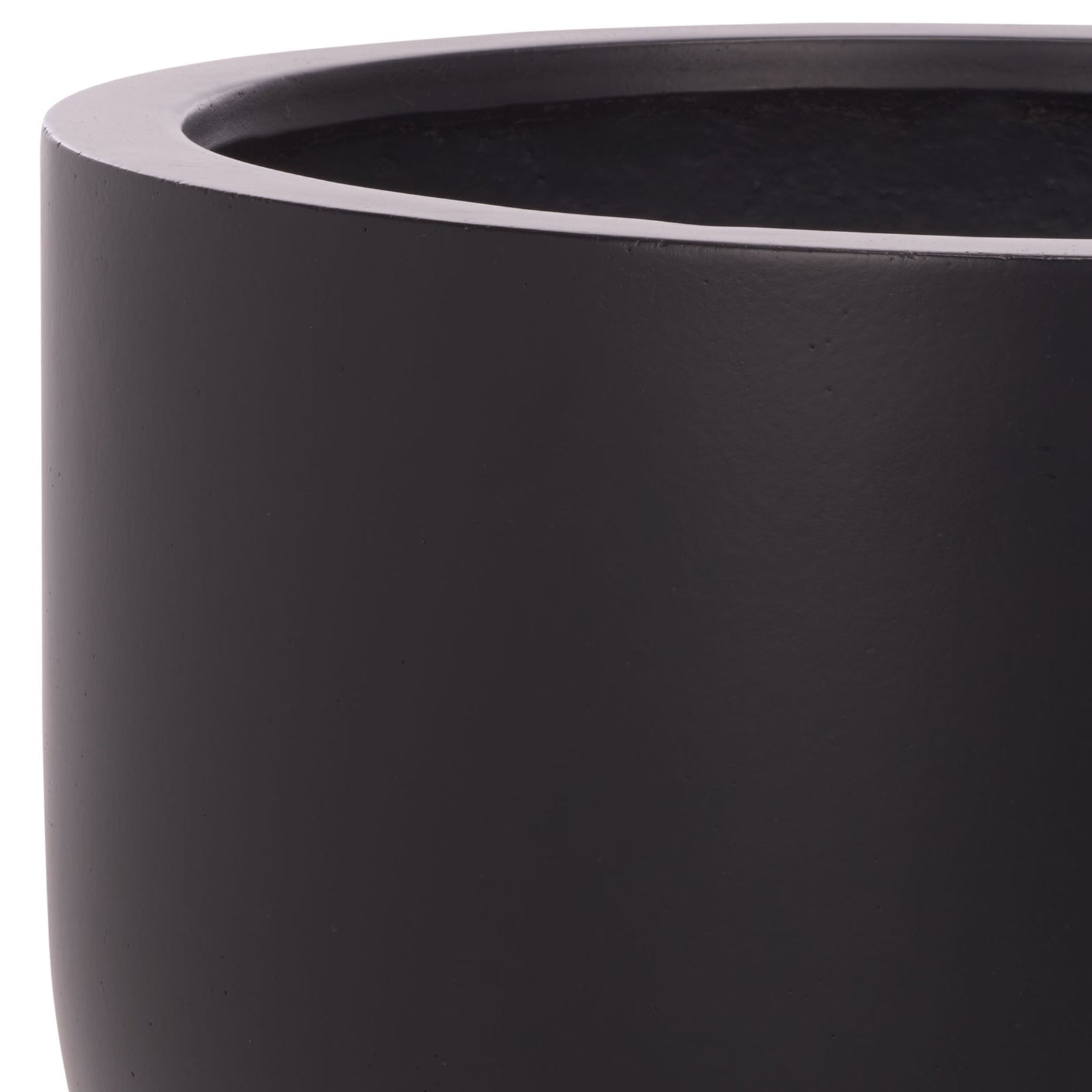 Smooth black planter bowl features a wide rim and a softly rounded outer wall. || PAT1546A || detail_studio