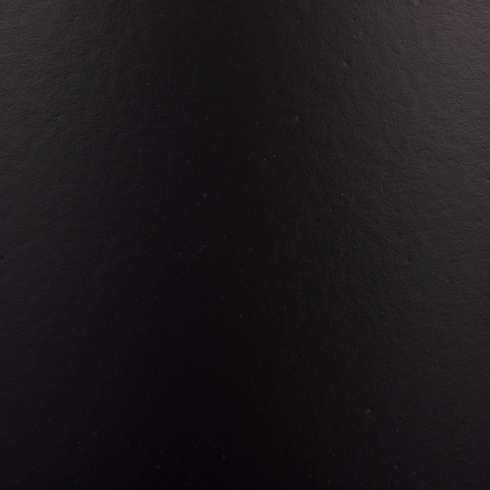 Subtle surface variations give the deep black finish a softly textured look. || PAT1546A || swatch_studio