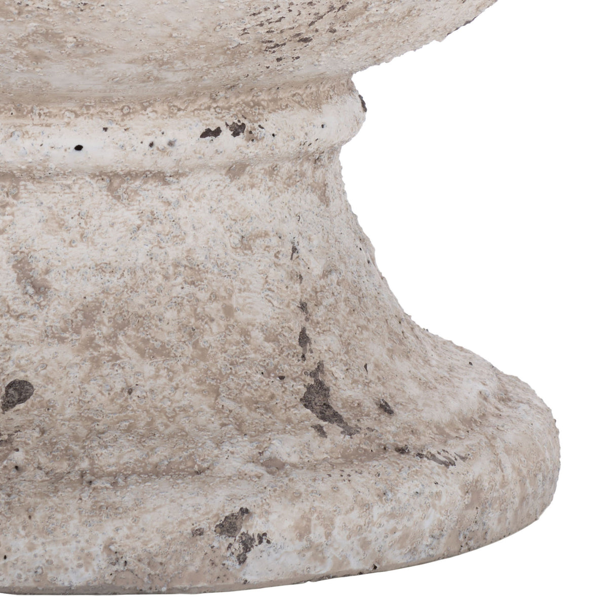 A broad pedestal foot supports the weathered white ficonstone bowl