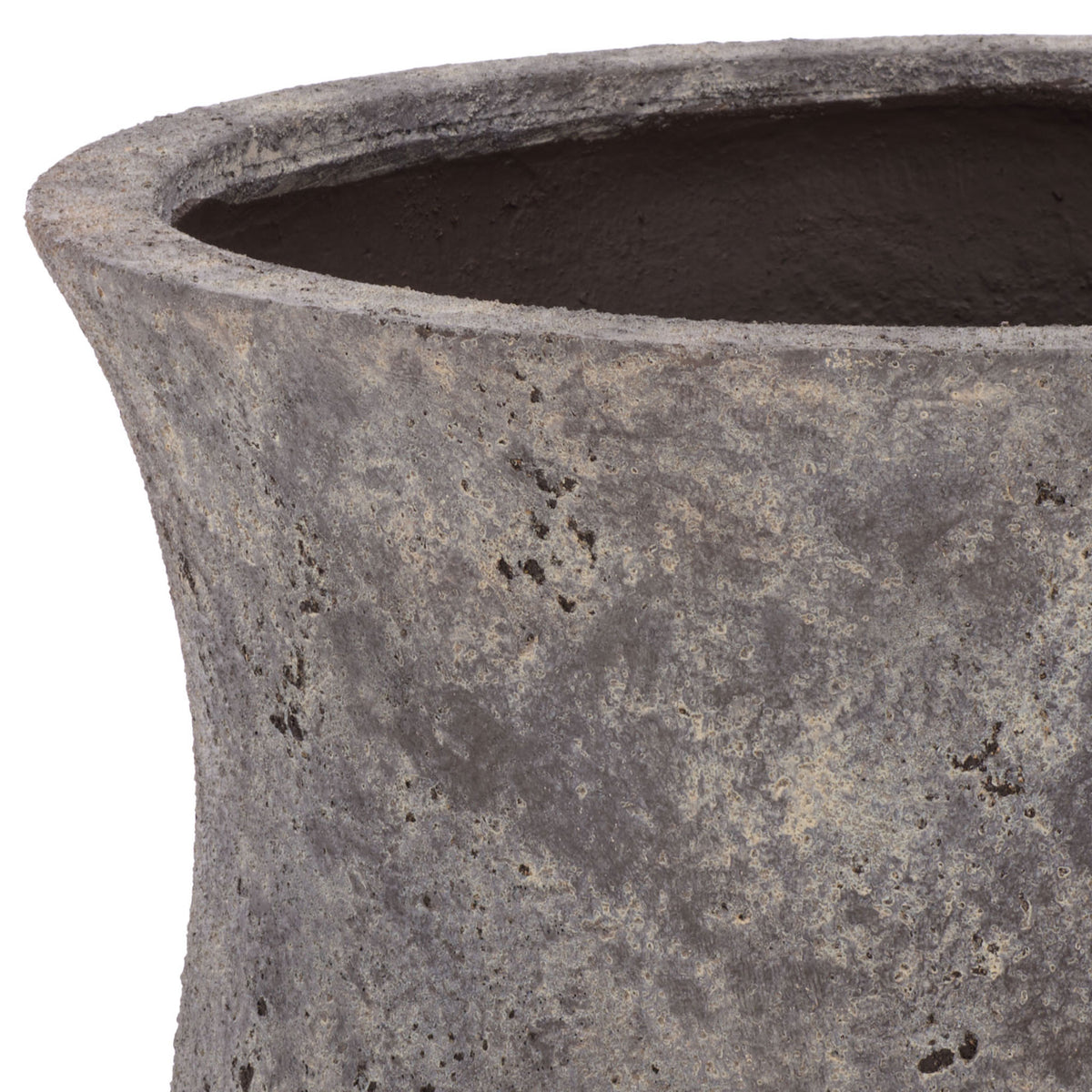 The gently flared lip meets a deep bowl with a rugged antique brown texture