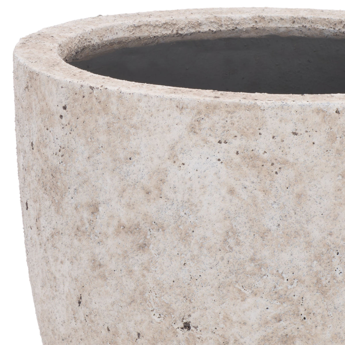 A thick rounded rim tops the planter's mottled antique white exterior and dark interior. || PAT1549B || detail_studio