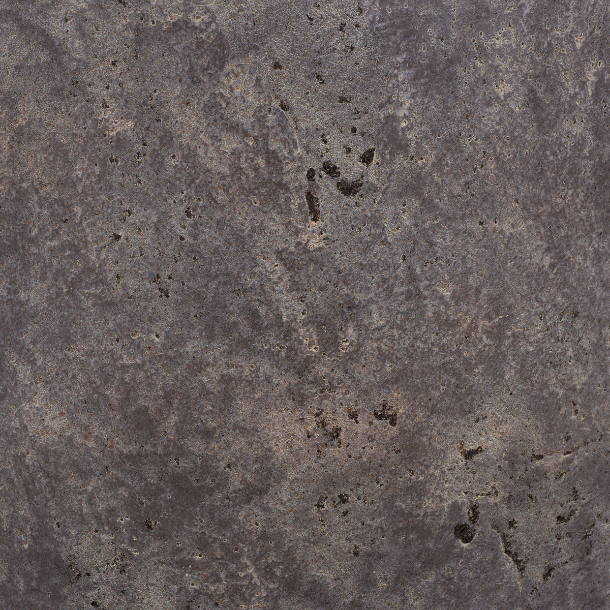 Varied brown-gray tones and dark speckles give the large planter a weathered stone effect. || PAT1550A || swatch_studio
