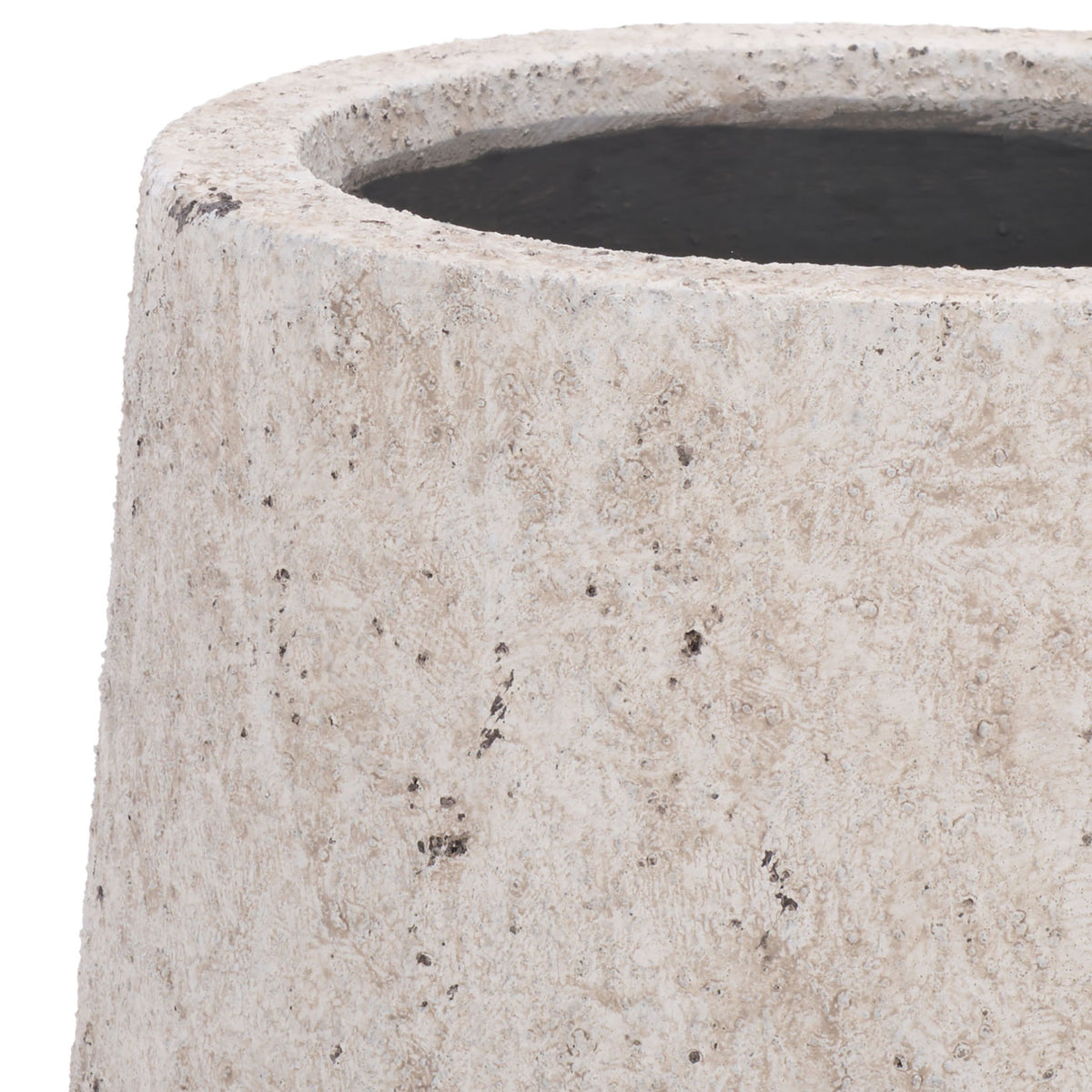 The planter's rounded rim shows subtle distressing around its deep, dark opening. || PAT1551B || detail_studio
