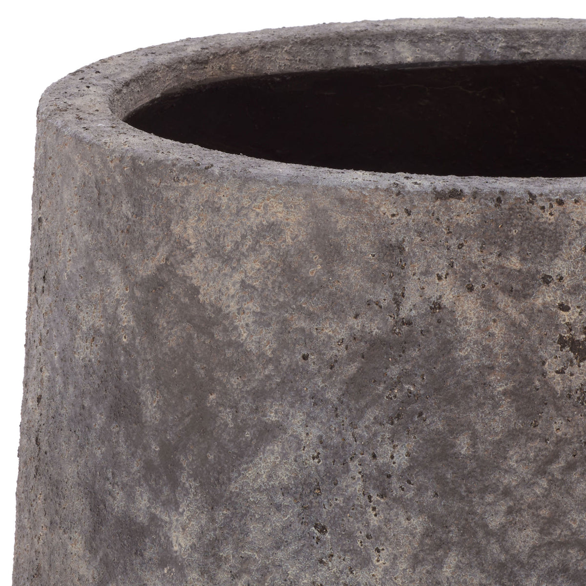 The large planter's thick rim and dark interior contrast with its rugged antique brown exterior. || PAT1552A || detail_studio