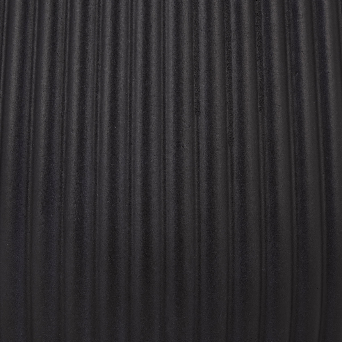 Closely spaced vertical grooves give the matte black planter a rich, tactile finish || PAT4601A-SET3 || swatch_studio