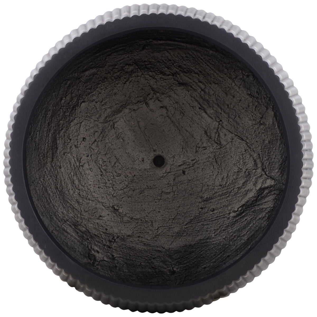 A deep black planting basin with a central drainage hole sits within a fluted rim || PAT4601A-SET3 || top_partial_studio