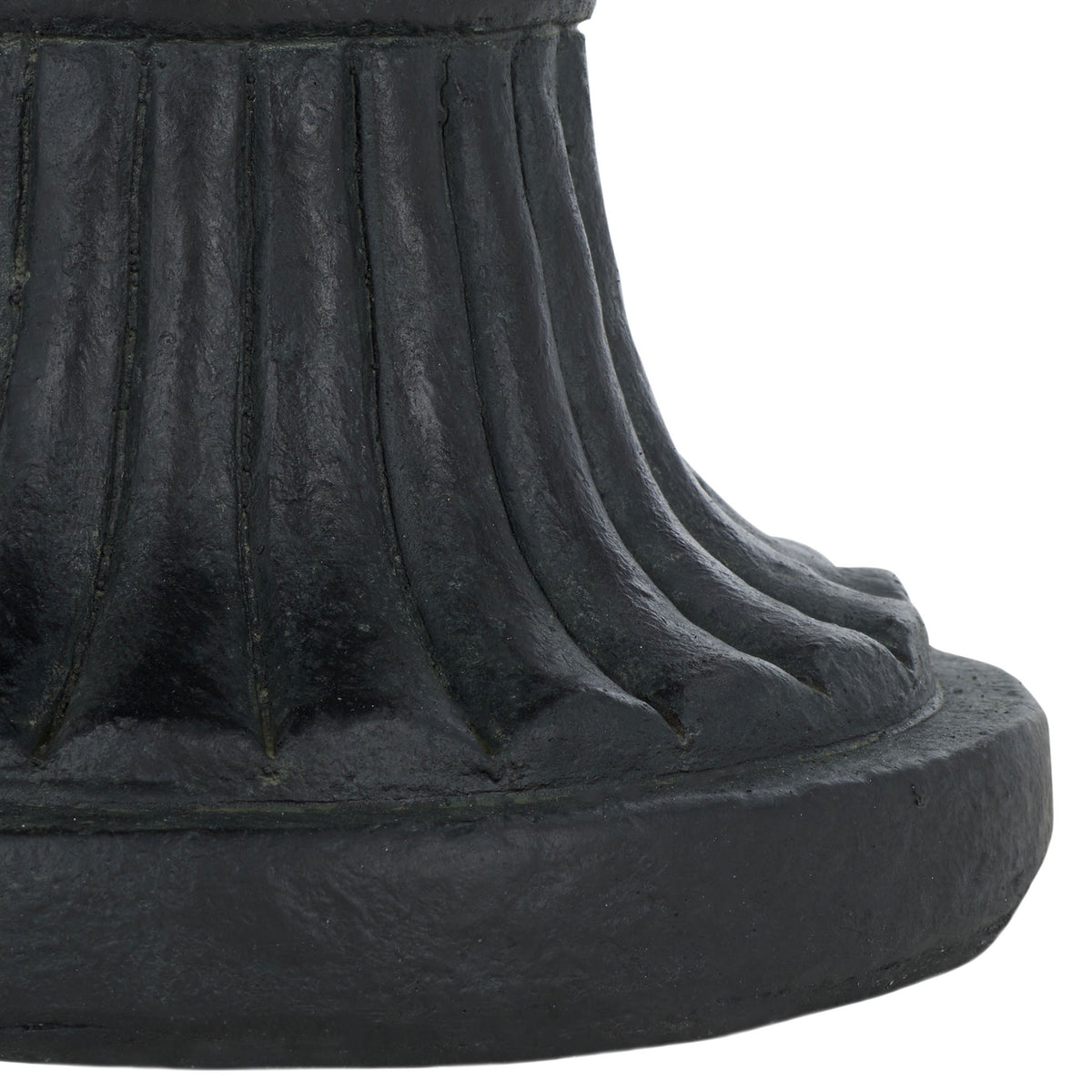 Deep fluting and a sturdy circular foot ground the black urn's graceful pedestal. || PAT5037E || leg_studio