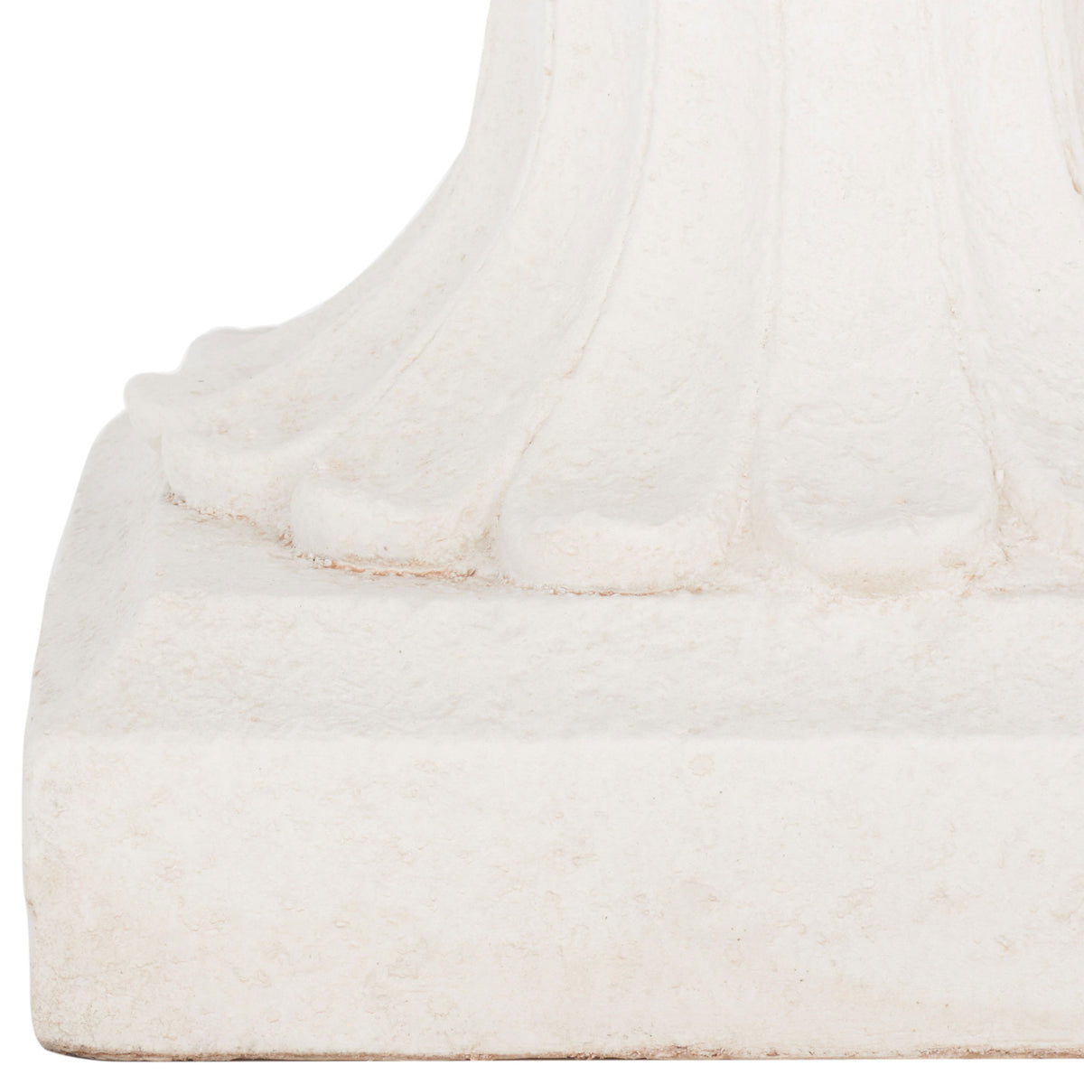 A sculpted, fluted pedestal rises from a square base in a softly aged off-white finish.