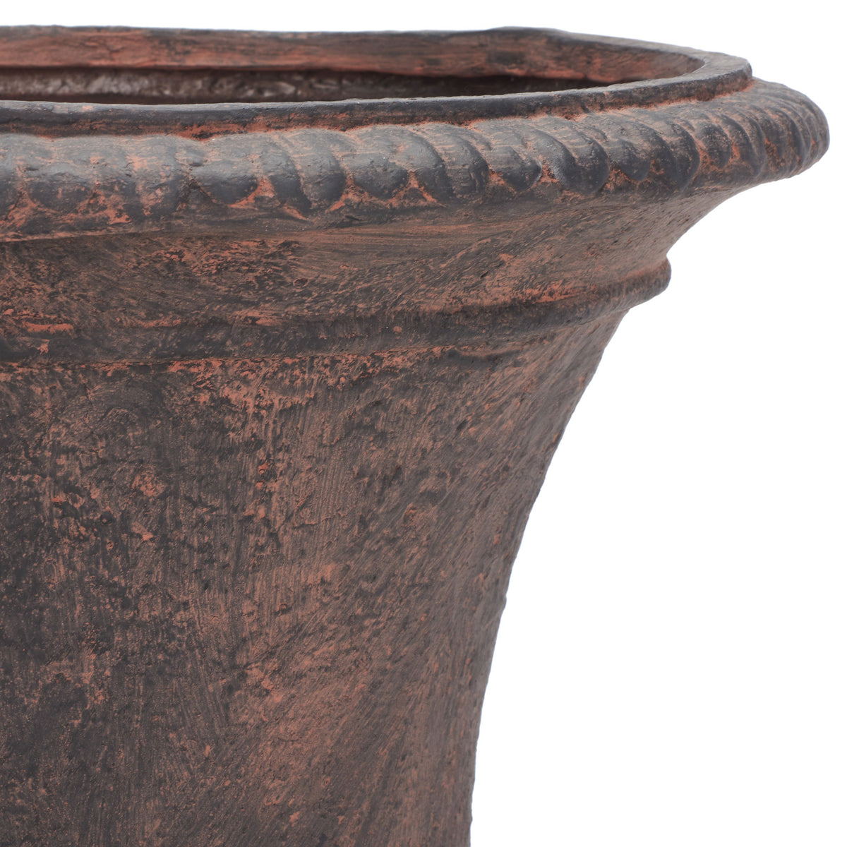 The brown planter's sculpted rim brings warm, weathered color to its gently tapered body. || PAT5038B || detail_studio