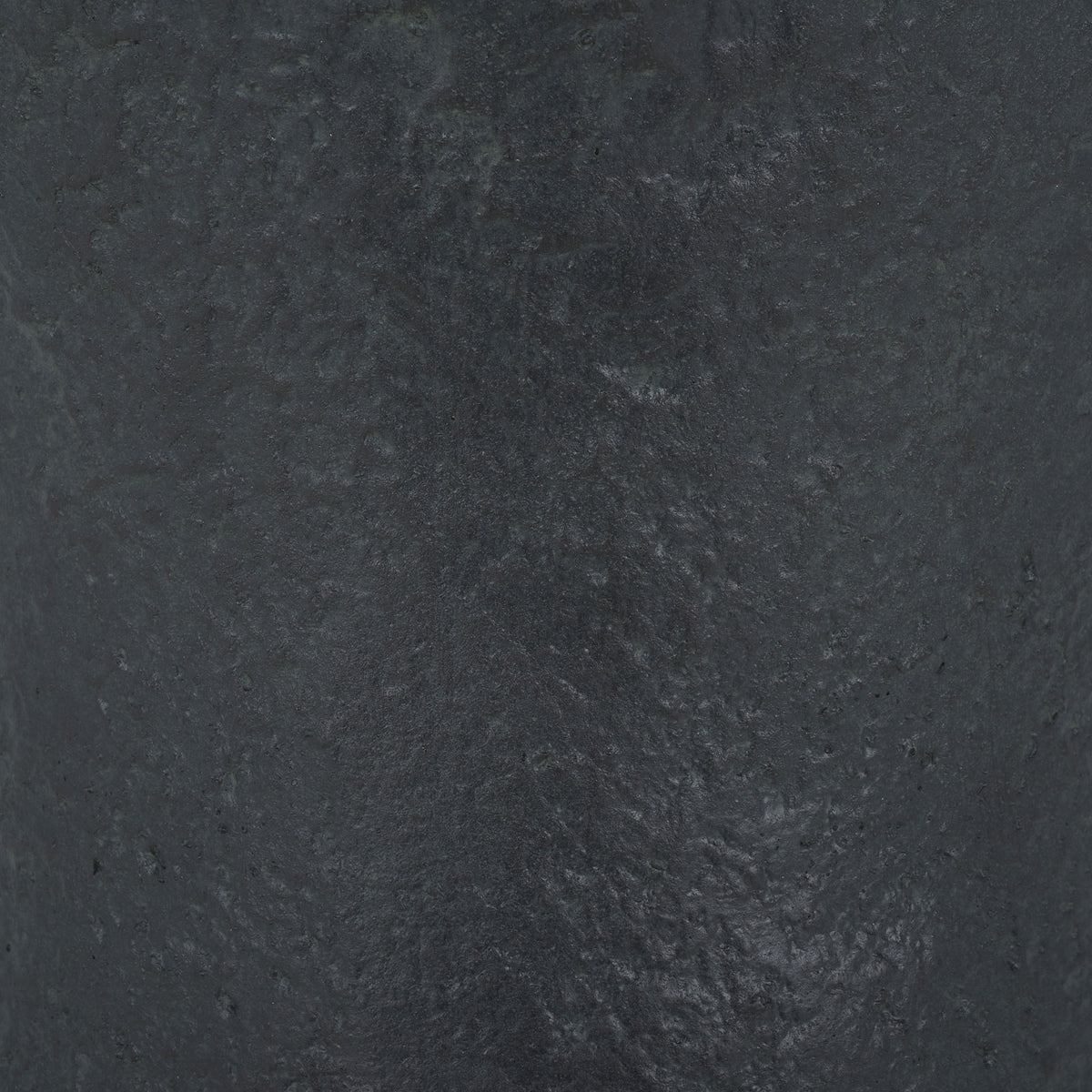 A softly mottled black surface gives the planter a weathered, stone-like finish. || PAT5038E || swatch_studio